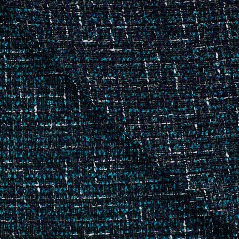 Chanel bouclé turquoise met gekleurde weving
