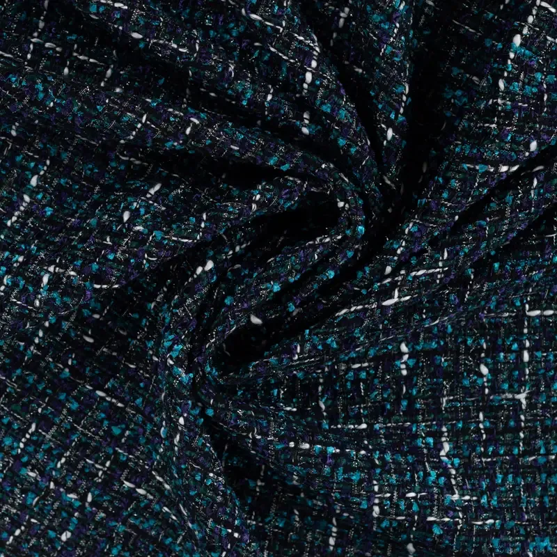 Chanel bouclé turquoise met gekleurde weving