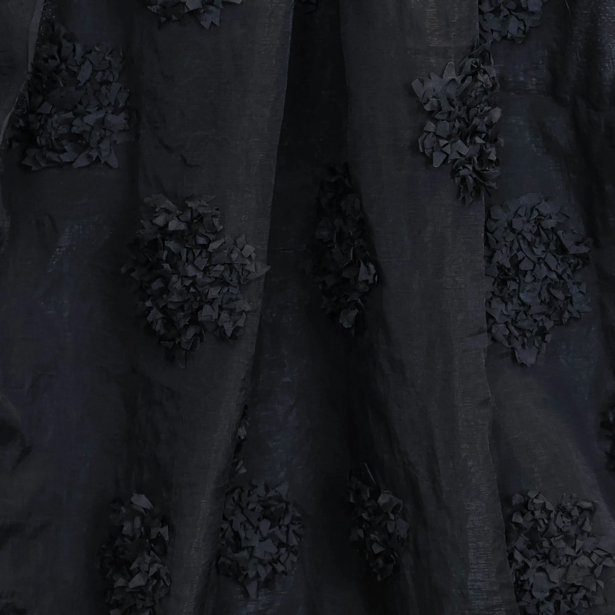 Polyester zwart met opgenaaide bloemen - Burda