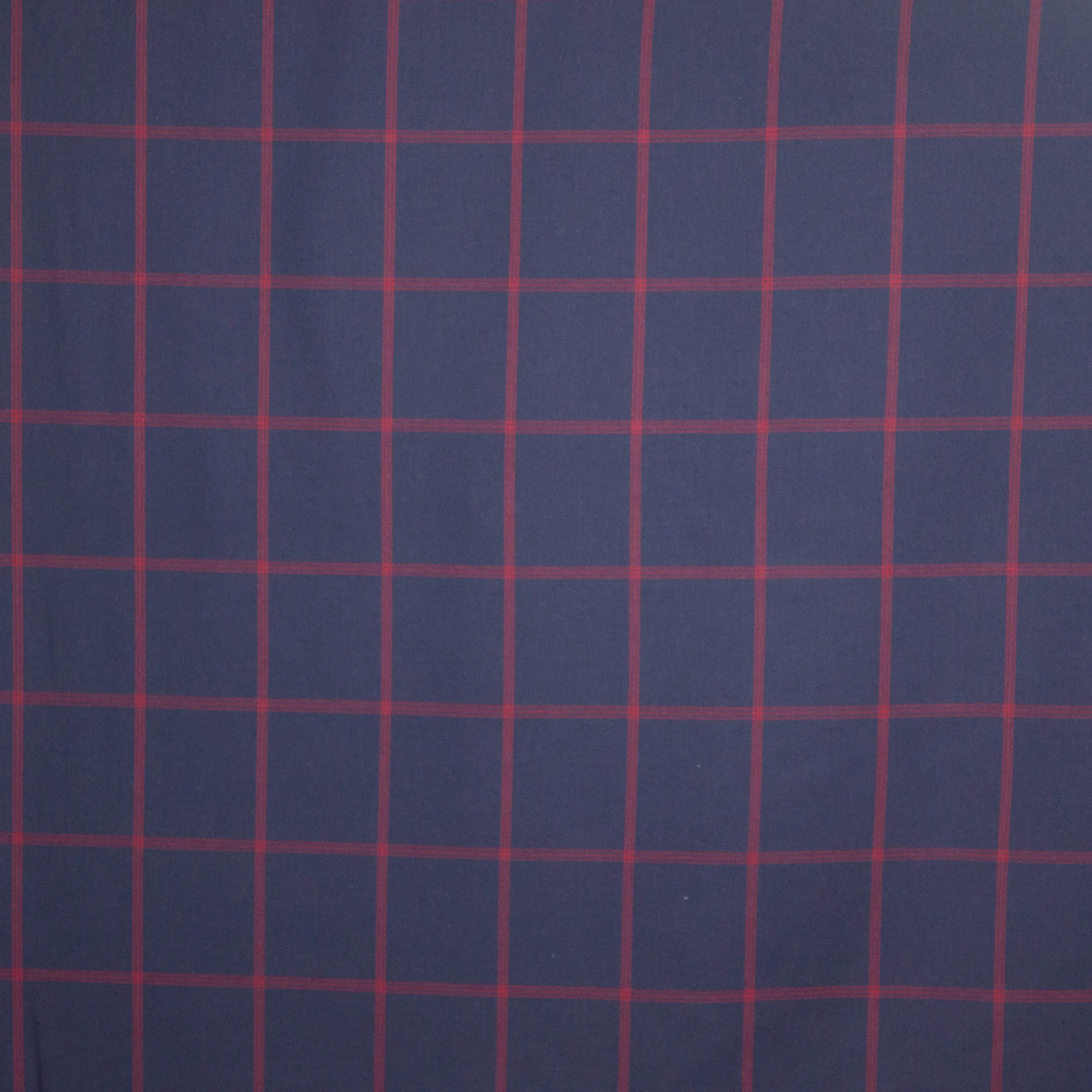 Blauwe katoen-polyester met rode ruiten