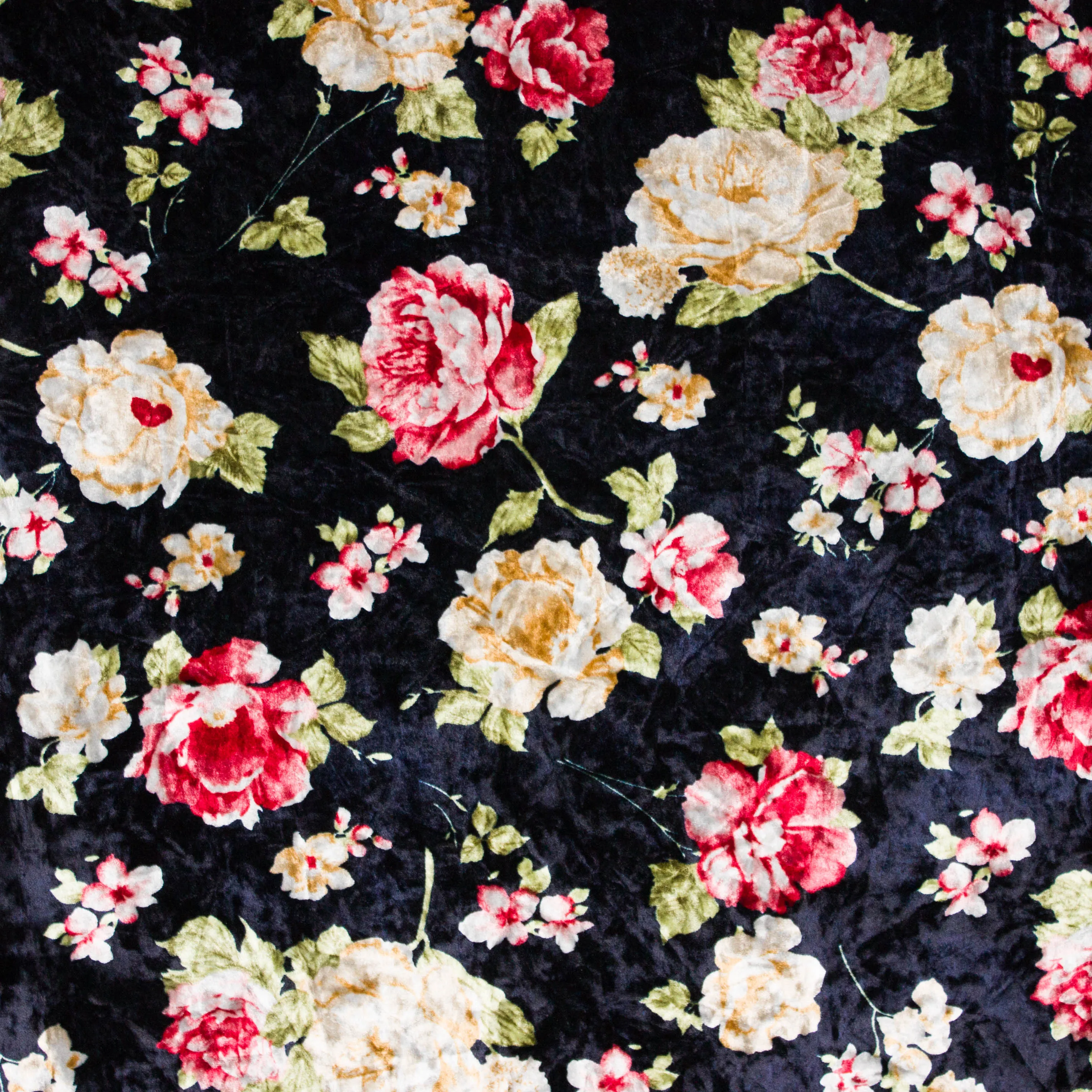 Stretch fluweel in donkerblauw met rozen