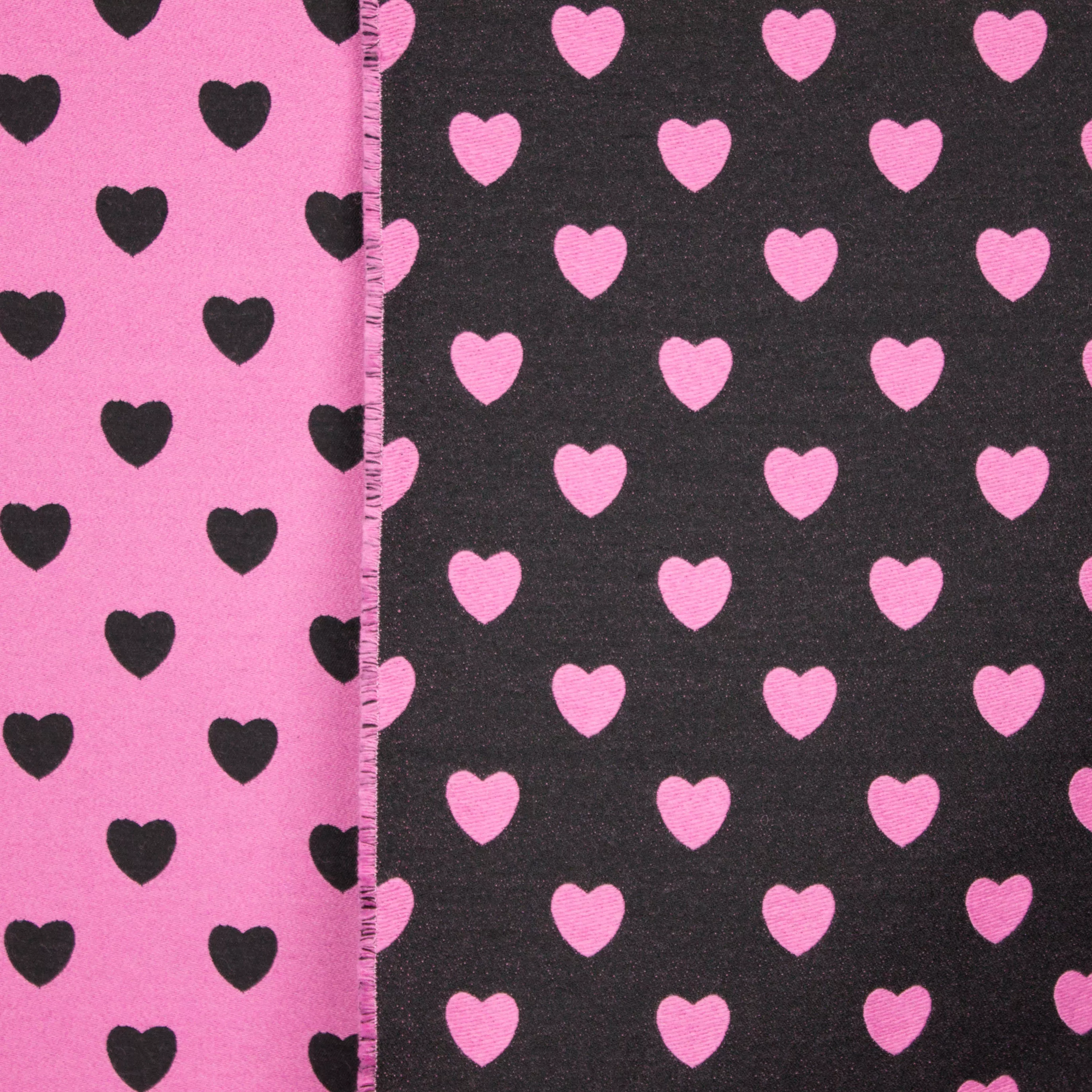 Double face jaquard met hartjes motief in zwart en roze