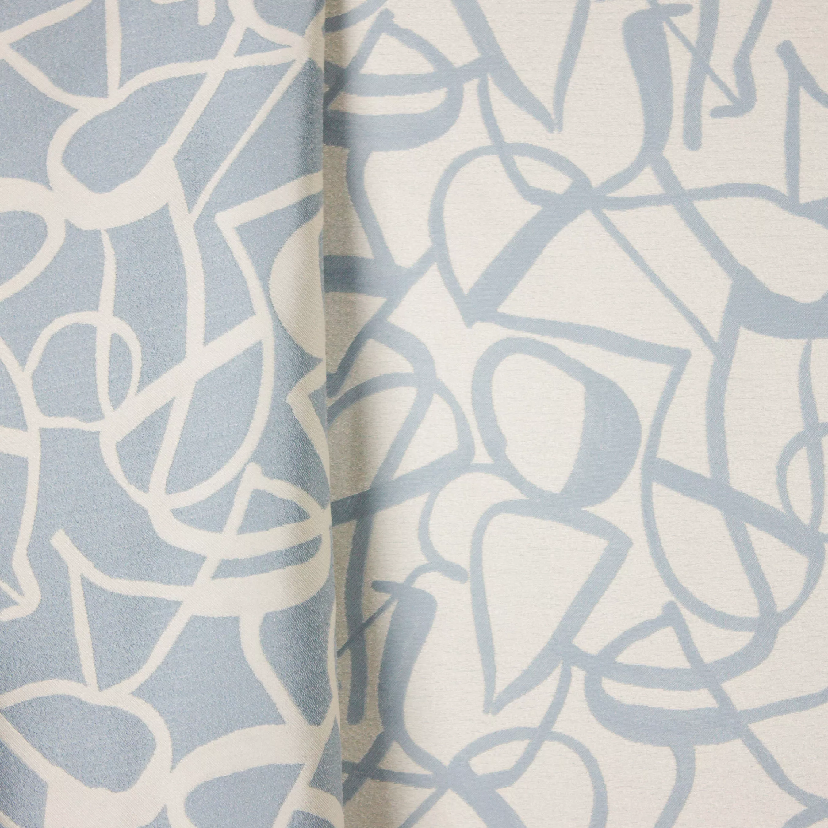 Gemêleerde polyester jacquard, double face met abstract lijnenmotief in ecru en lichtblauw