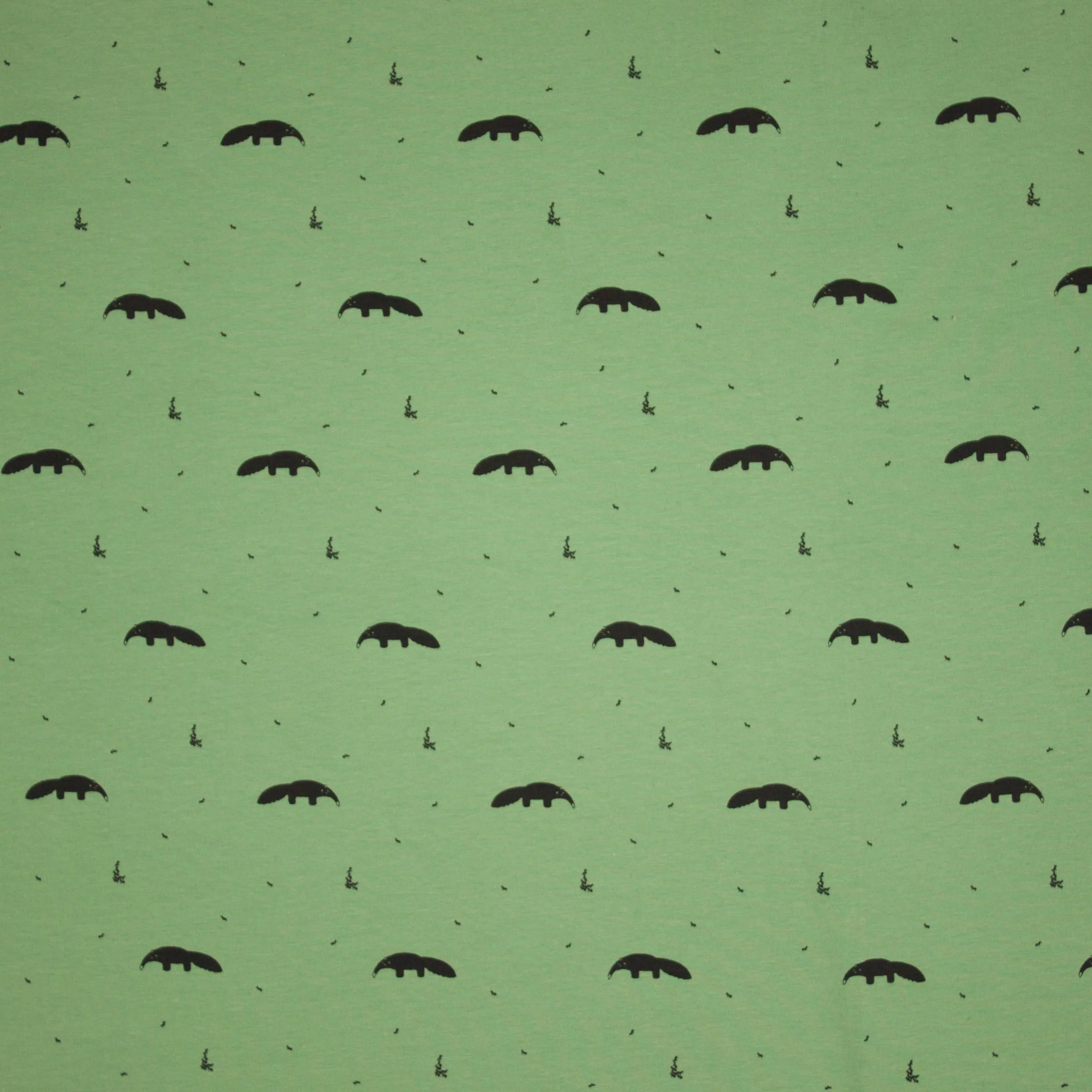 Organische tricot groen met abstracte zwarte diertjes van 'Froy en Dind'