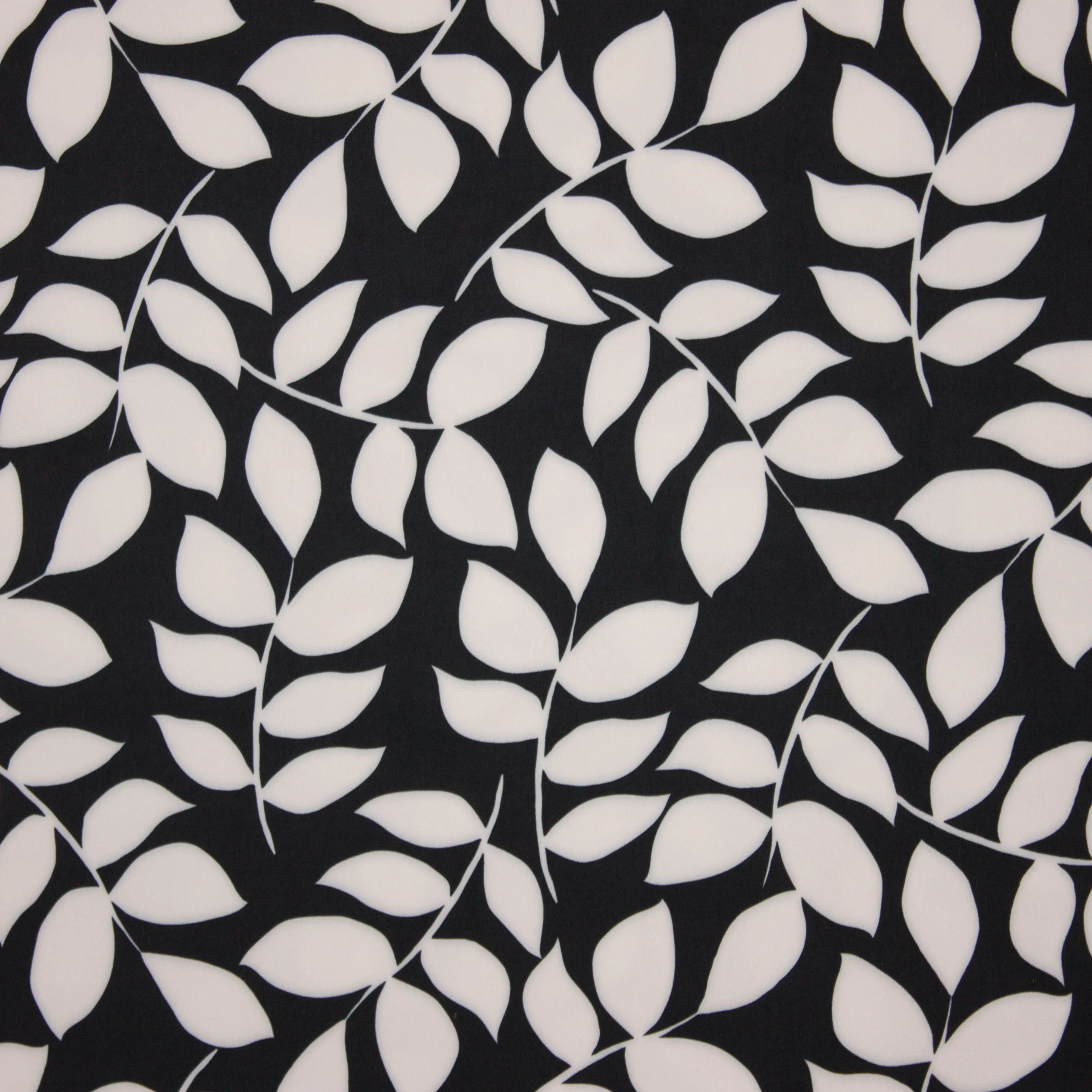Zwarte polyester met wit bladmotief