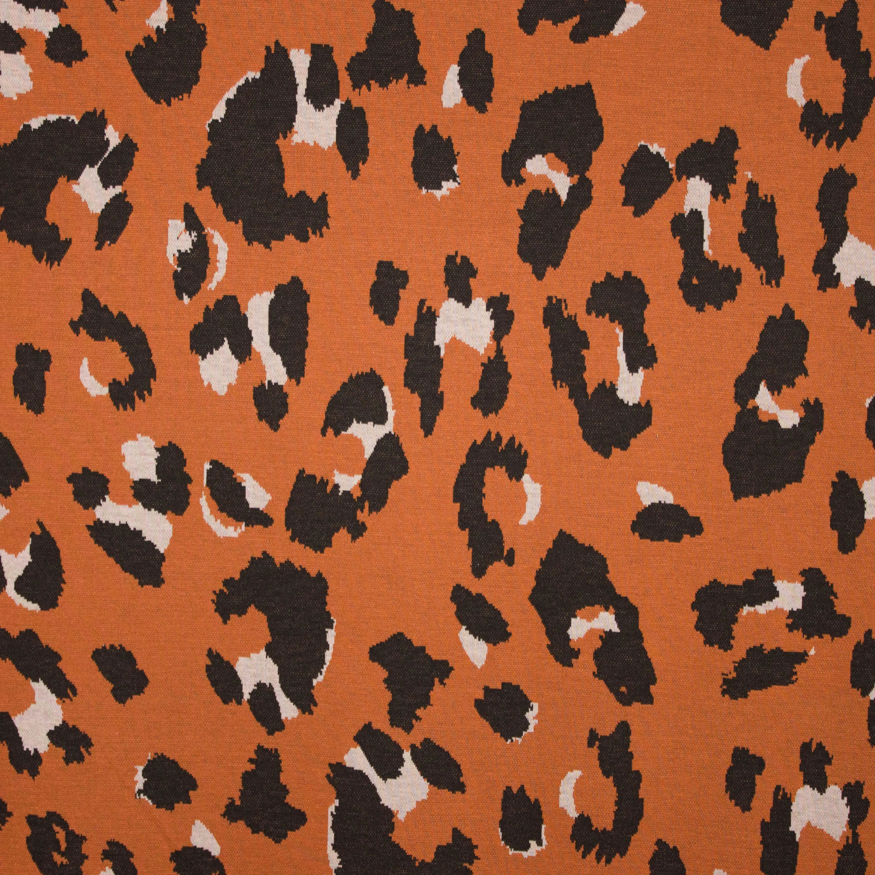 Roestkleurige stretch jacquard met vlekken motief van 'Milliblu's'