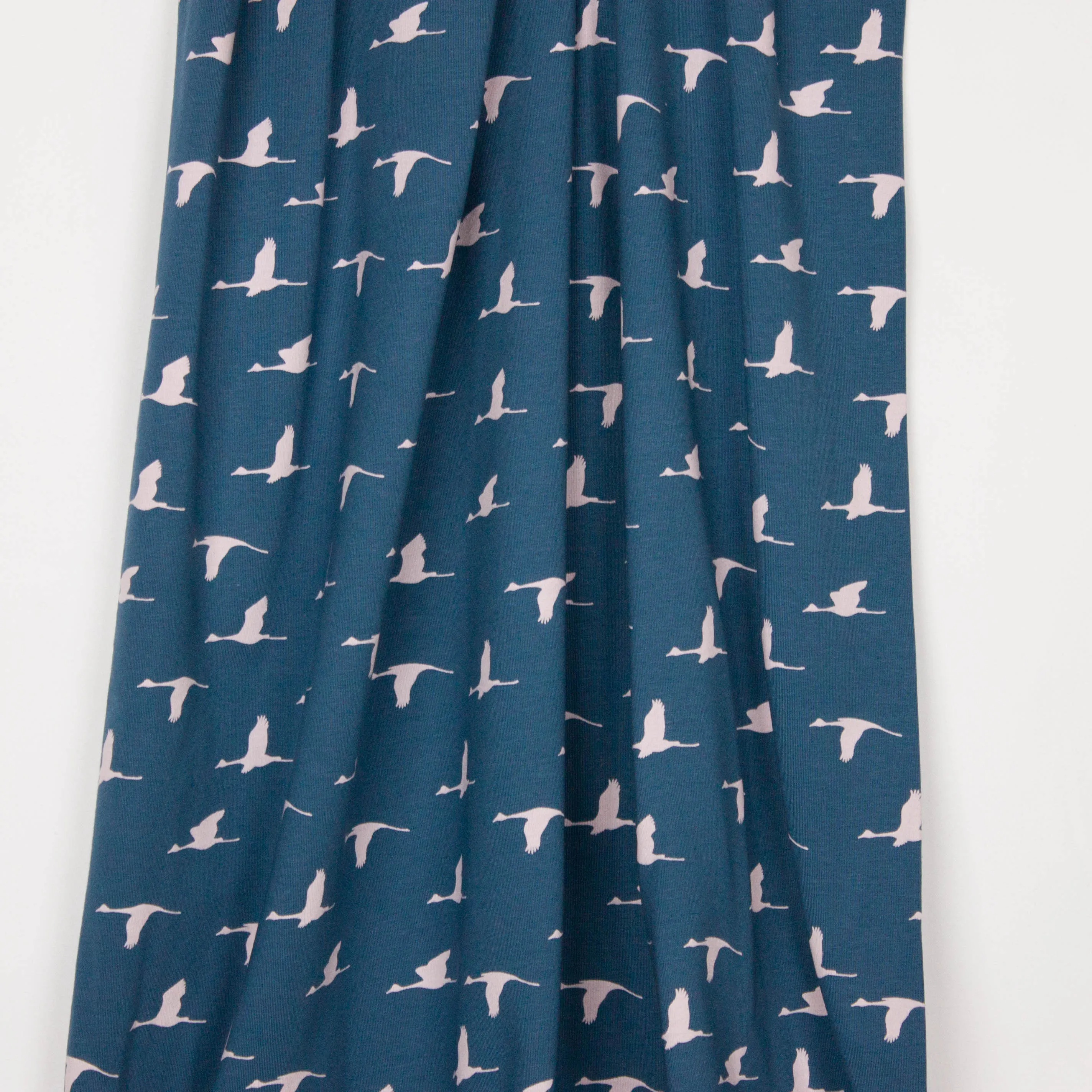 Blauwe tricot met roze ibissen