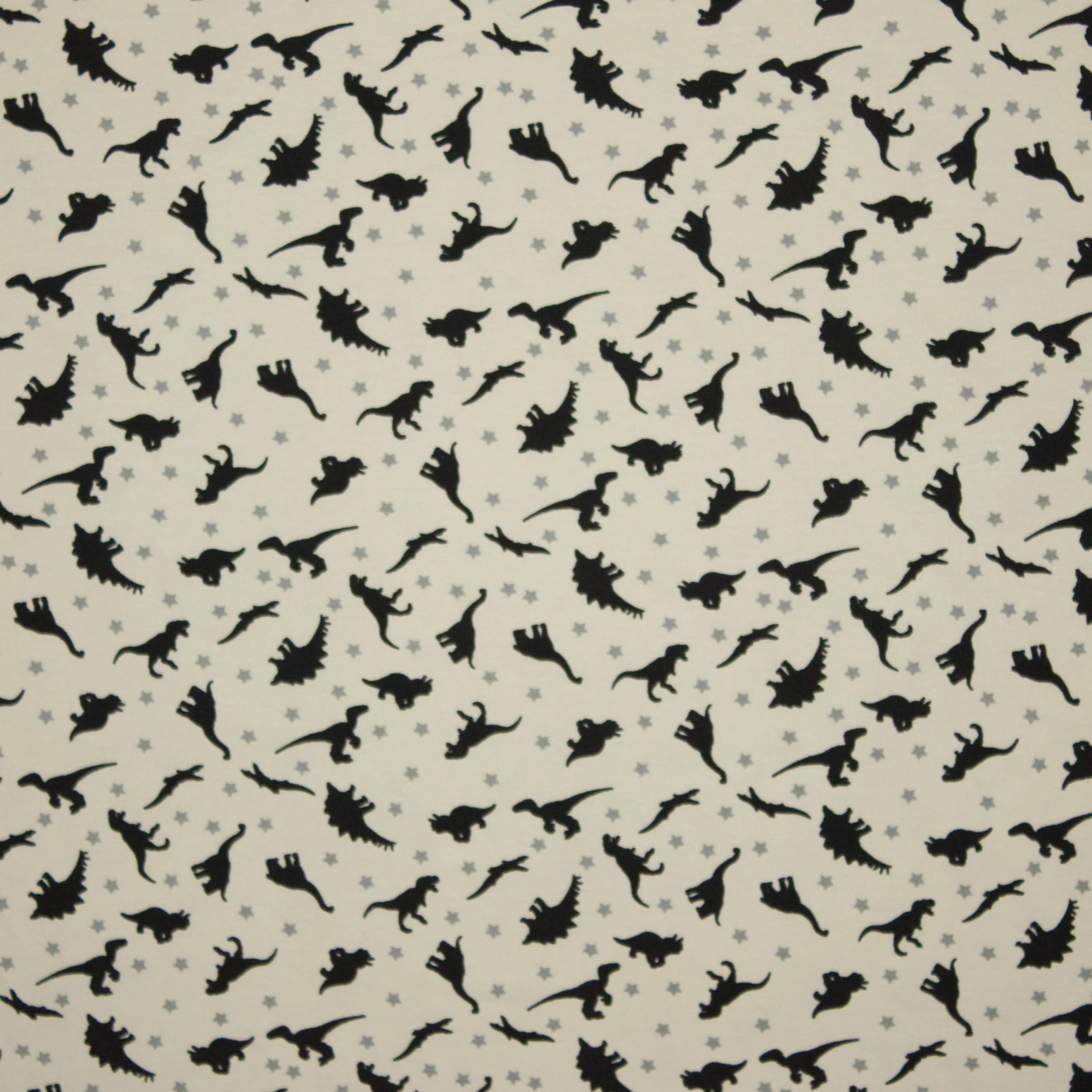 Creme katoen tricot met dinosaurus motief