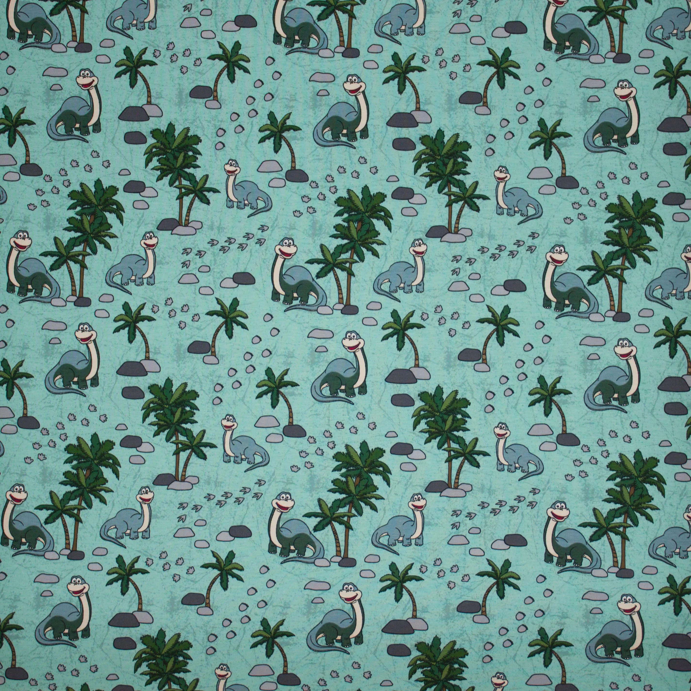 Munt tricot met dino's en palmbomen