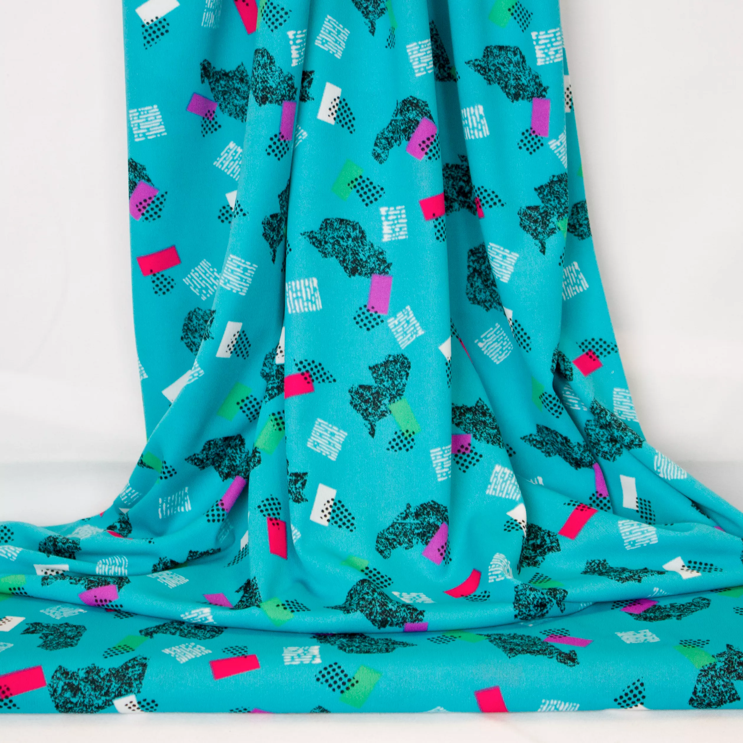 Blauwe polyester tricot met abstract motief