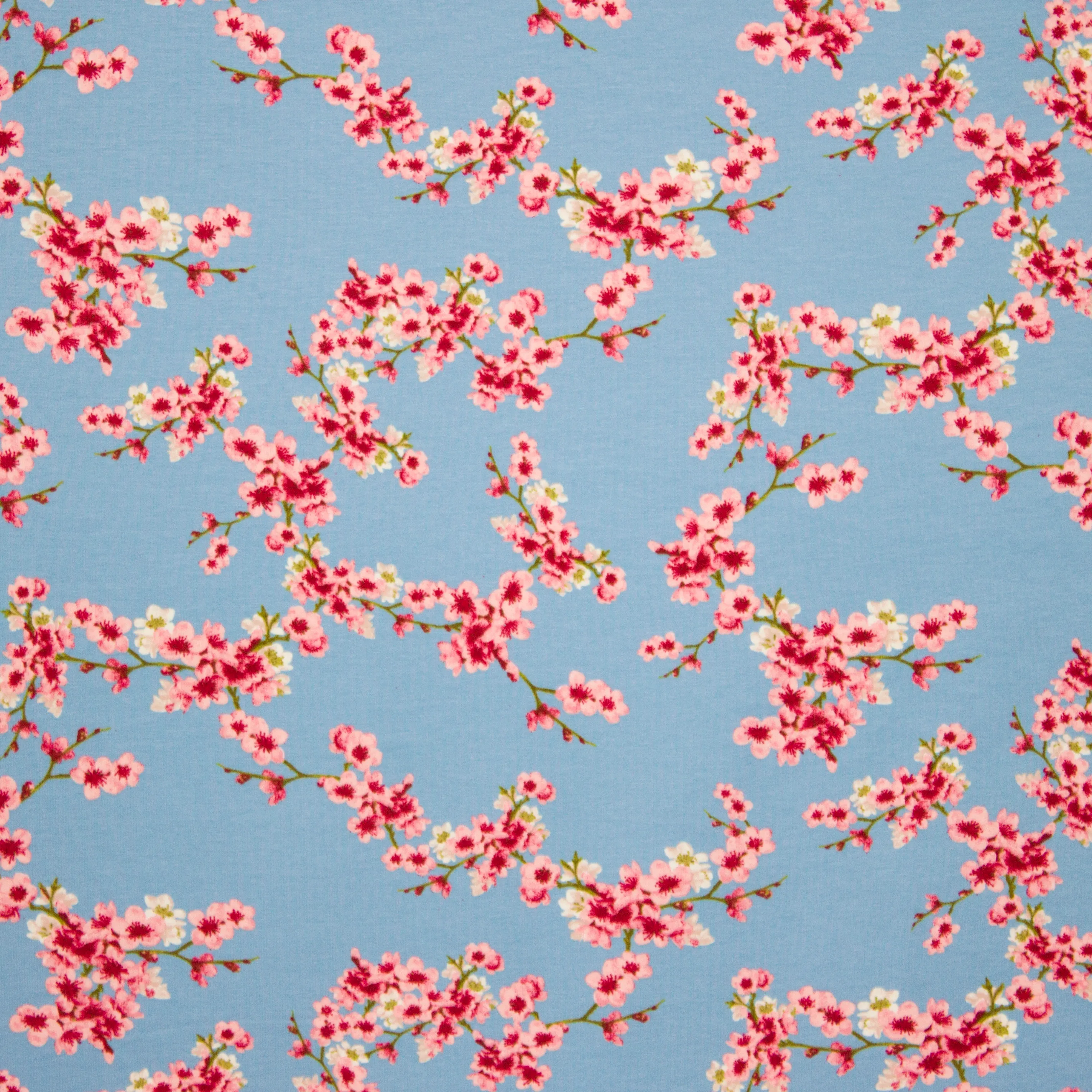 Blauwe sweaterstof met roze bloemen van Poppy