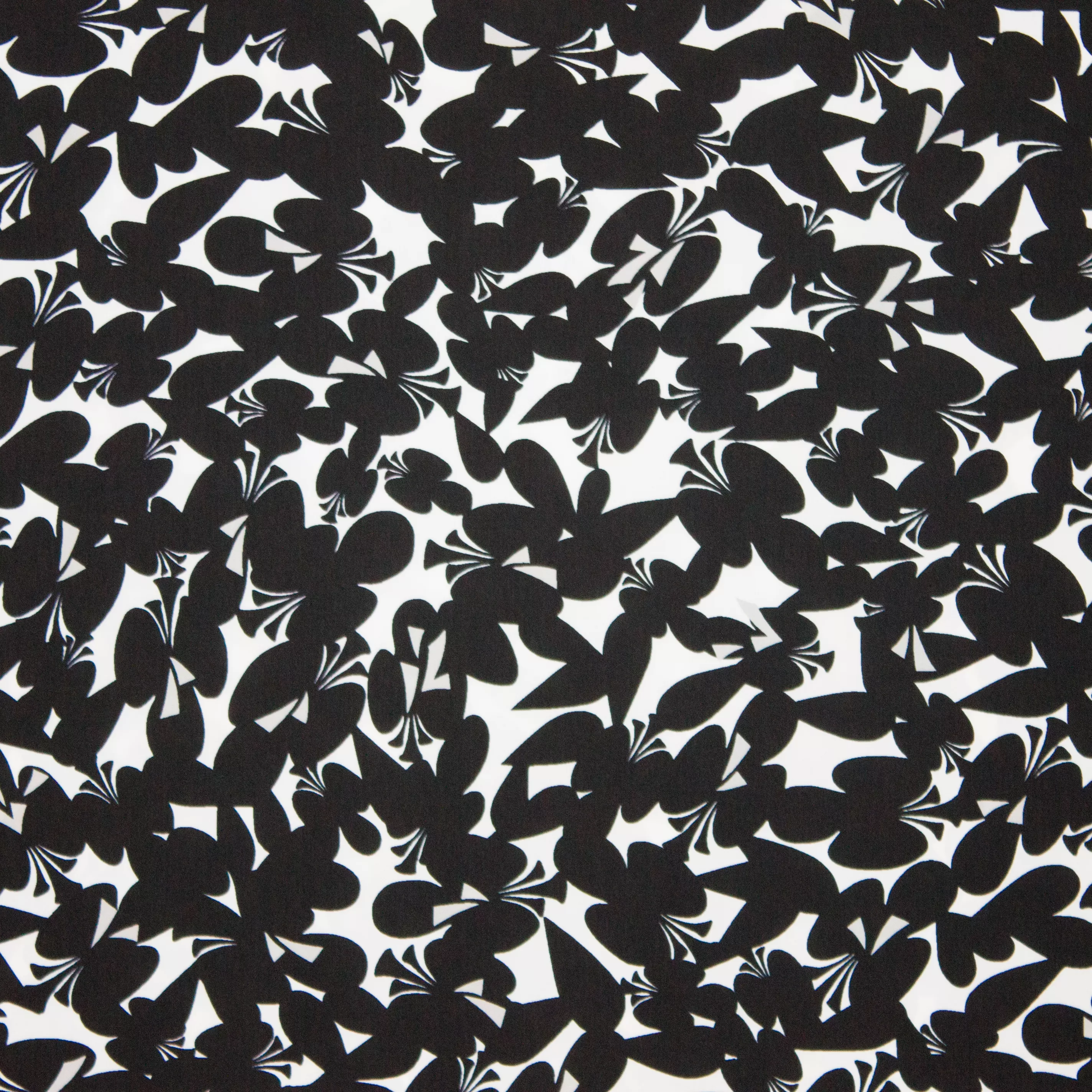 Witte polyester met zwarte klavers