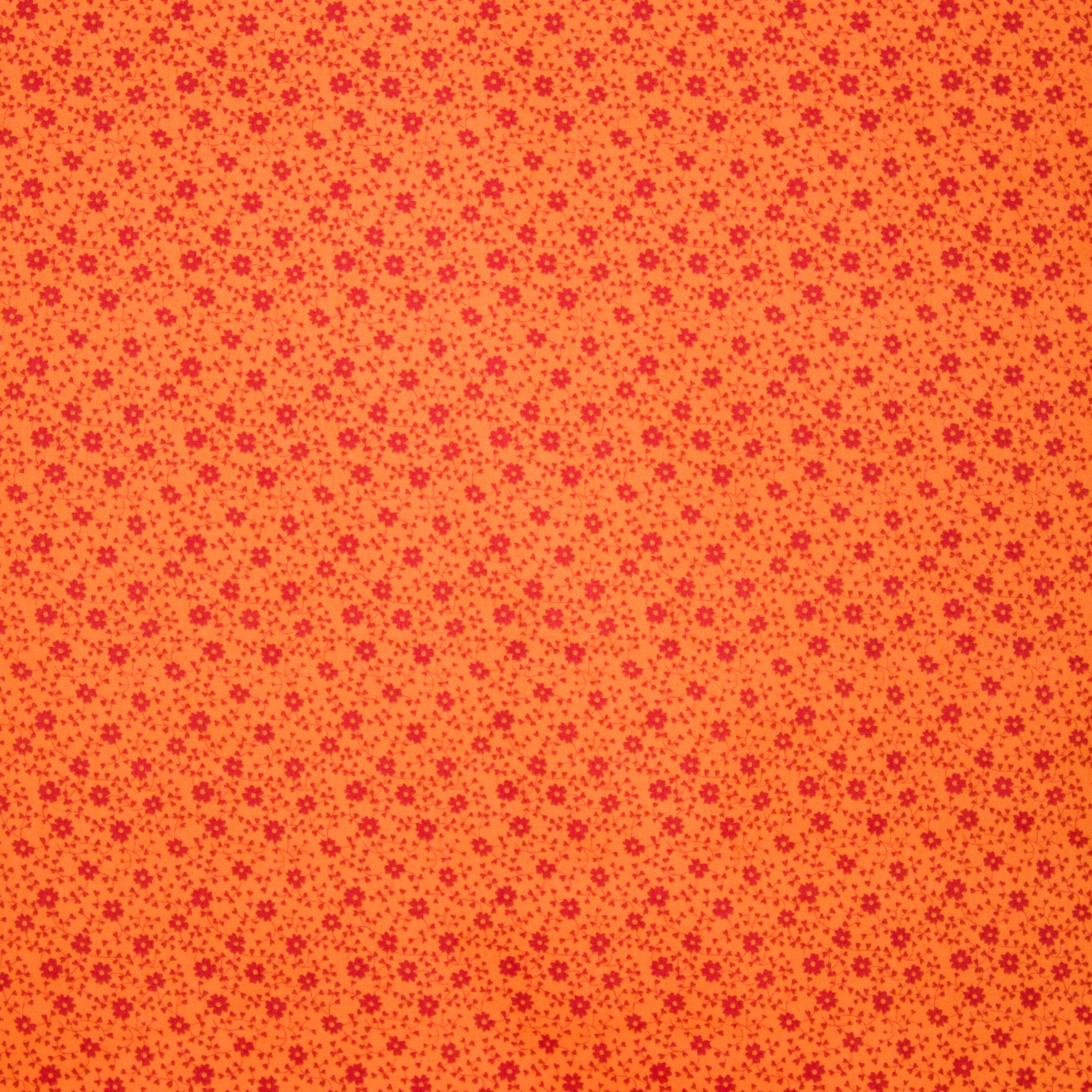 Oranje katoen met rood bloemenmotief