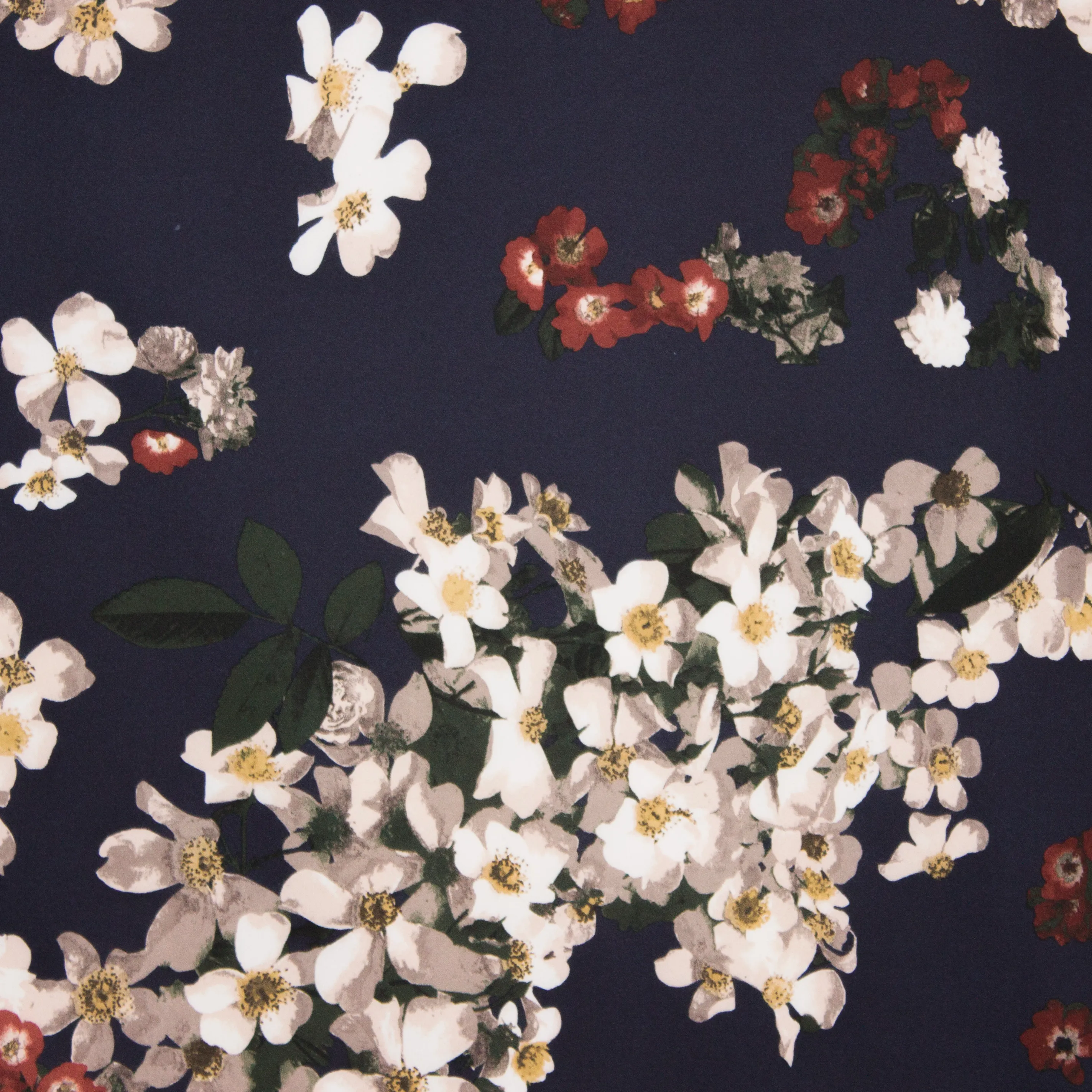 Blauwe polyester tricot met bloemen