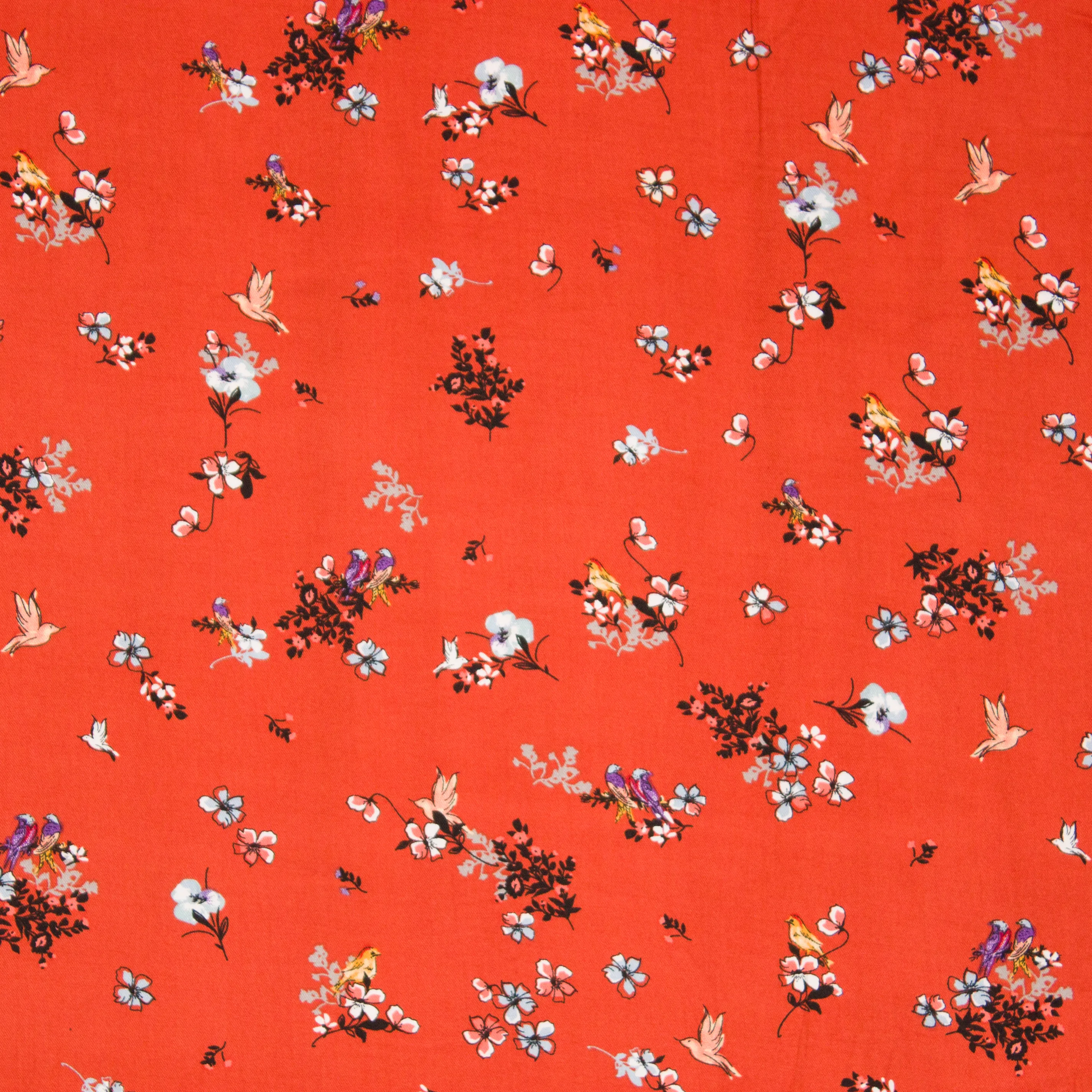 Oranje viscose twill met bloemen