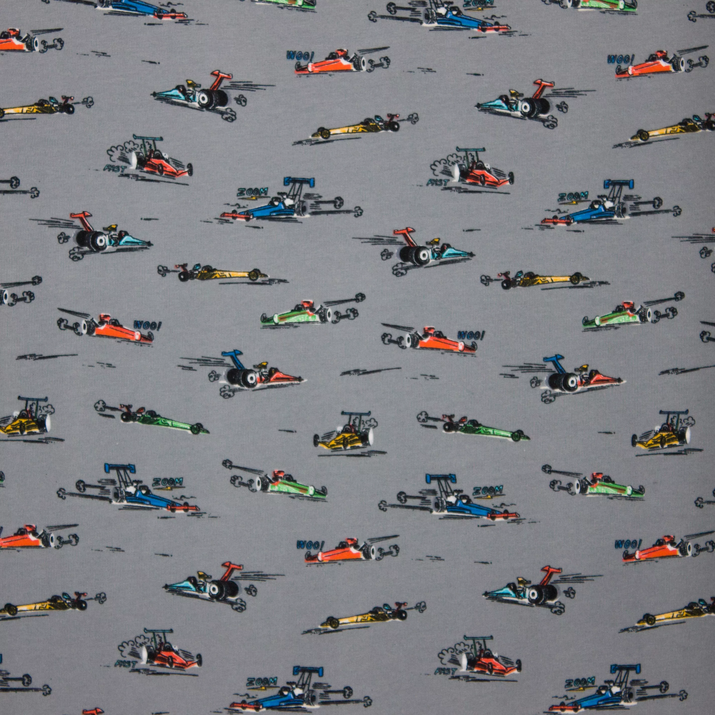 Grijze sweaterstof met racewagens van Poppy