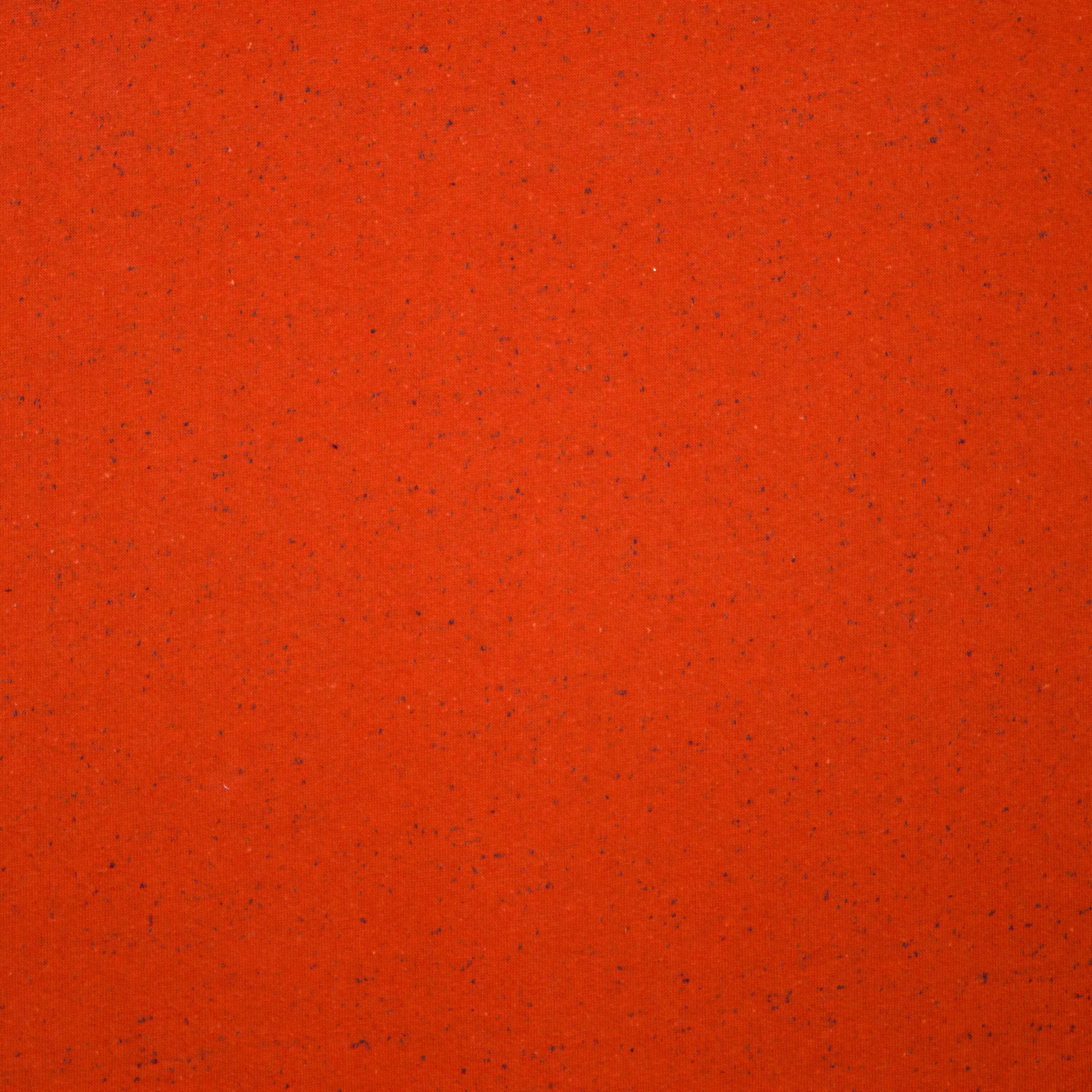 Oranje gespikkelde sweaterstof met gebrushte achterkant van Poppy