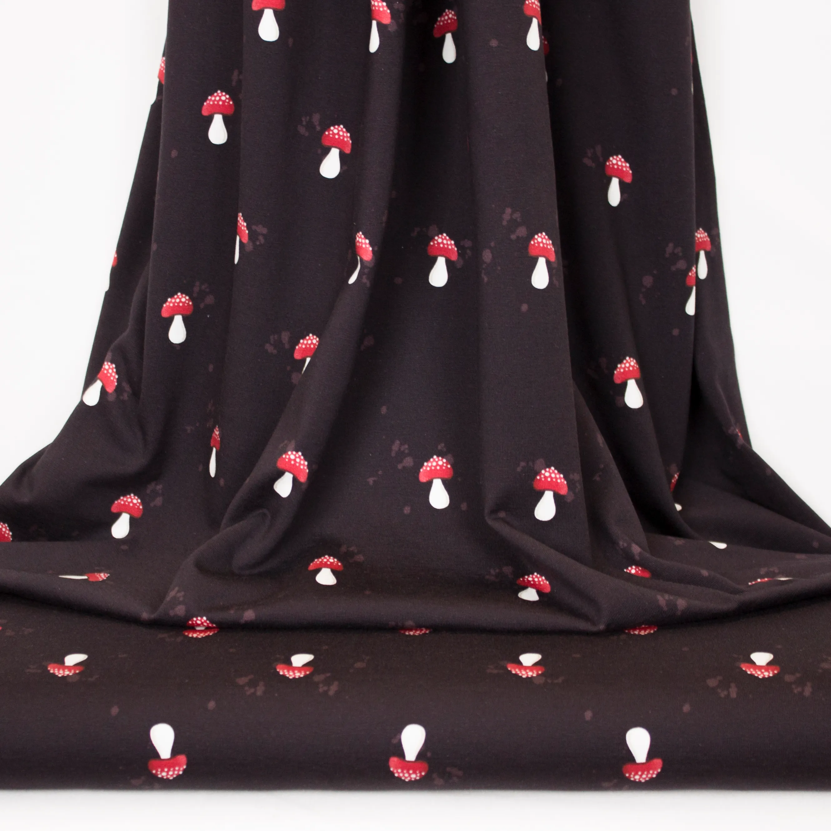 Donkere tricot met paddenstoelen