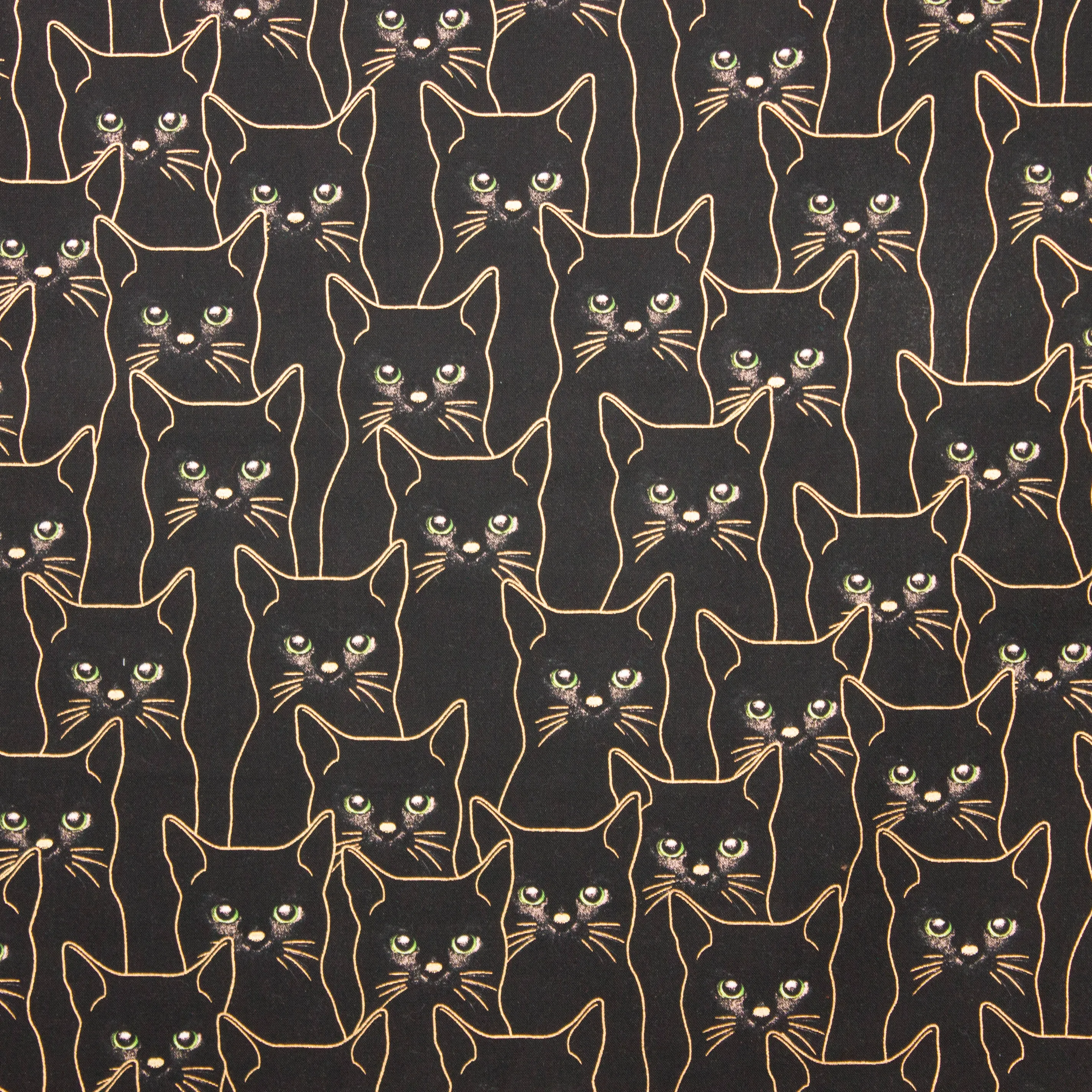 Zwart katoentje met poezen in gouden glitter