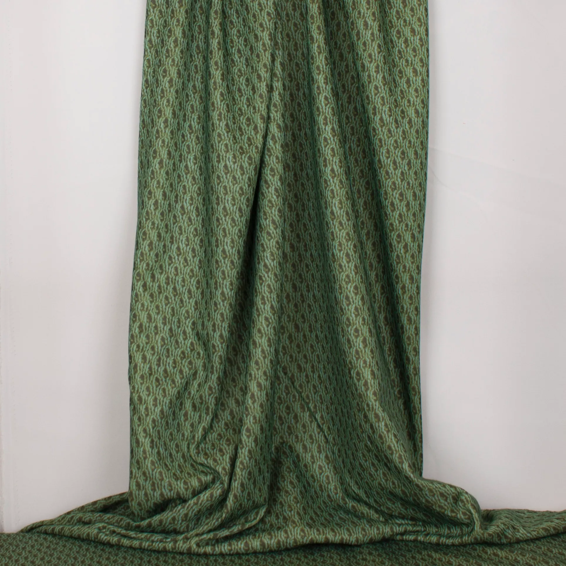 Groene polyester met print van gebreide stof