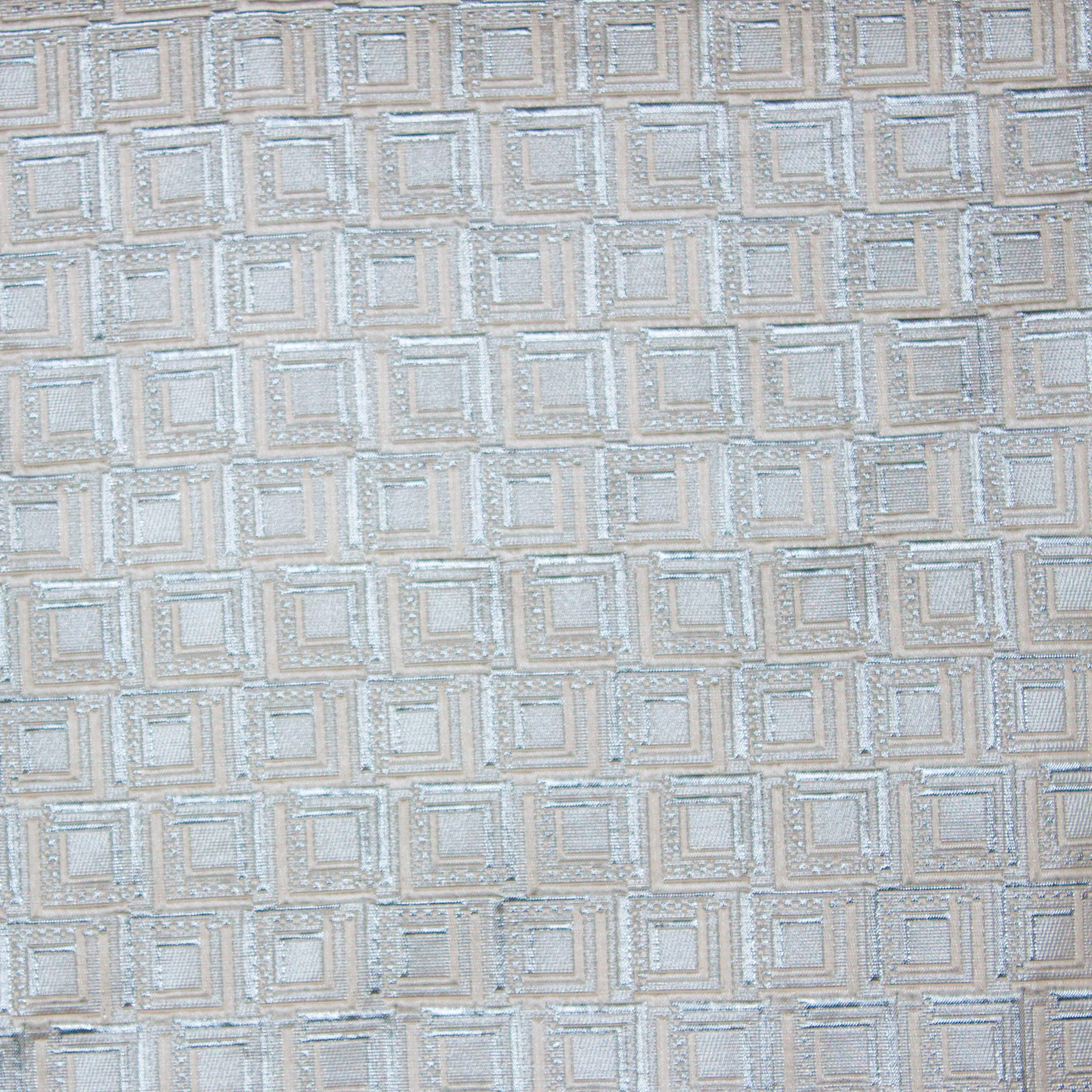 Italiaans jacquard met zilveren en grijs abstract motief