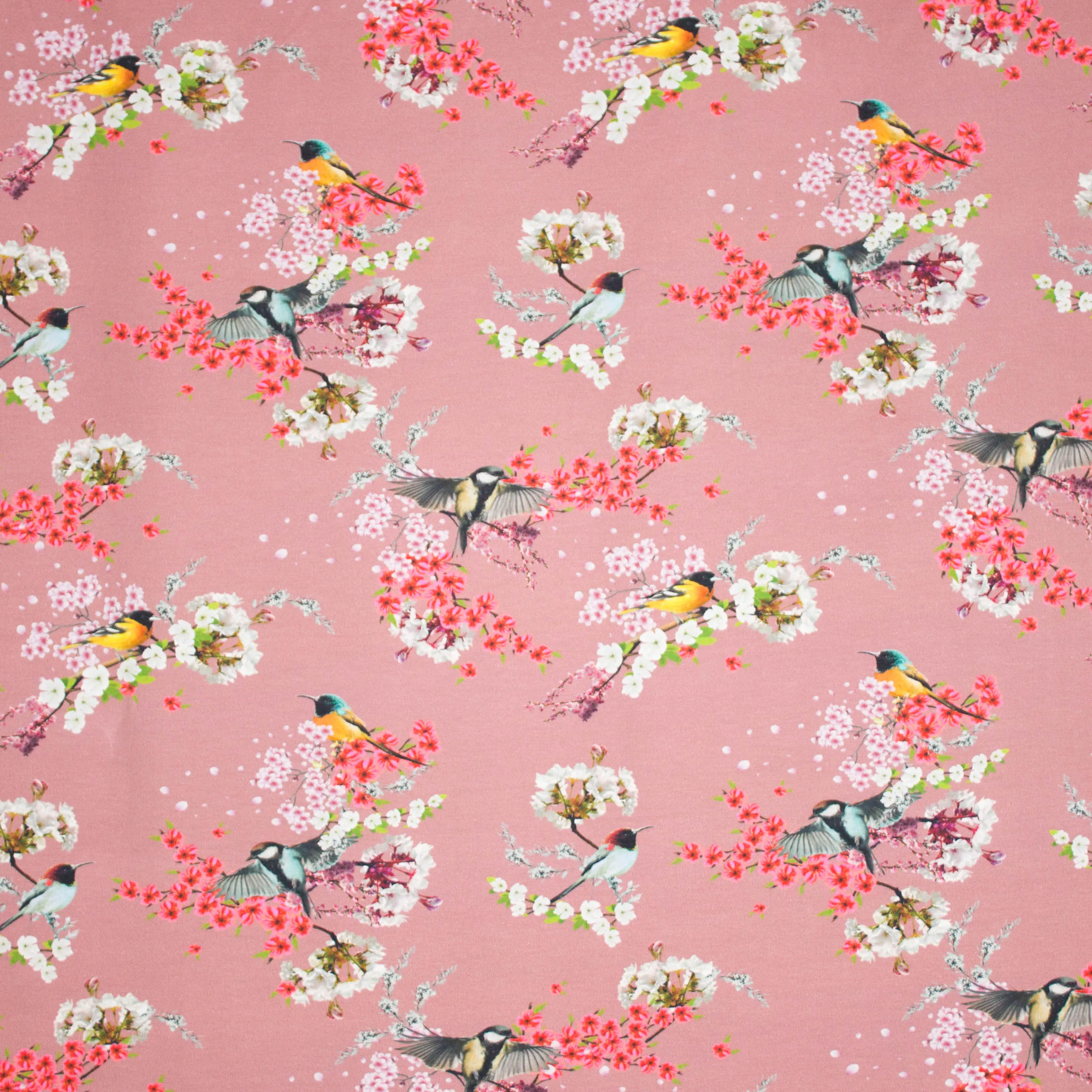 Oudroze tricot met bloemen en vogels motief van 'Megan Blue Fabrics'
