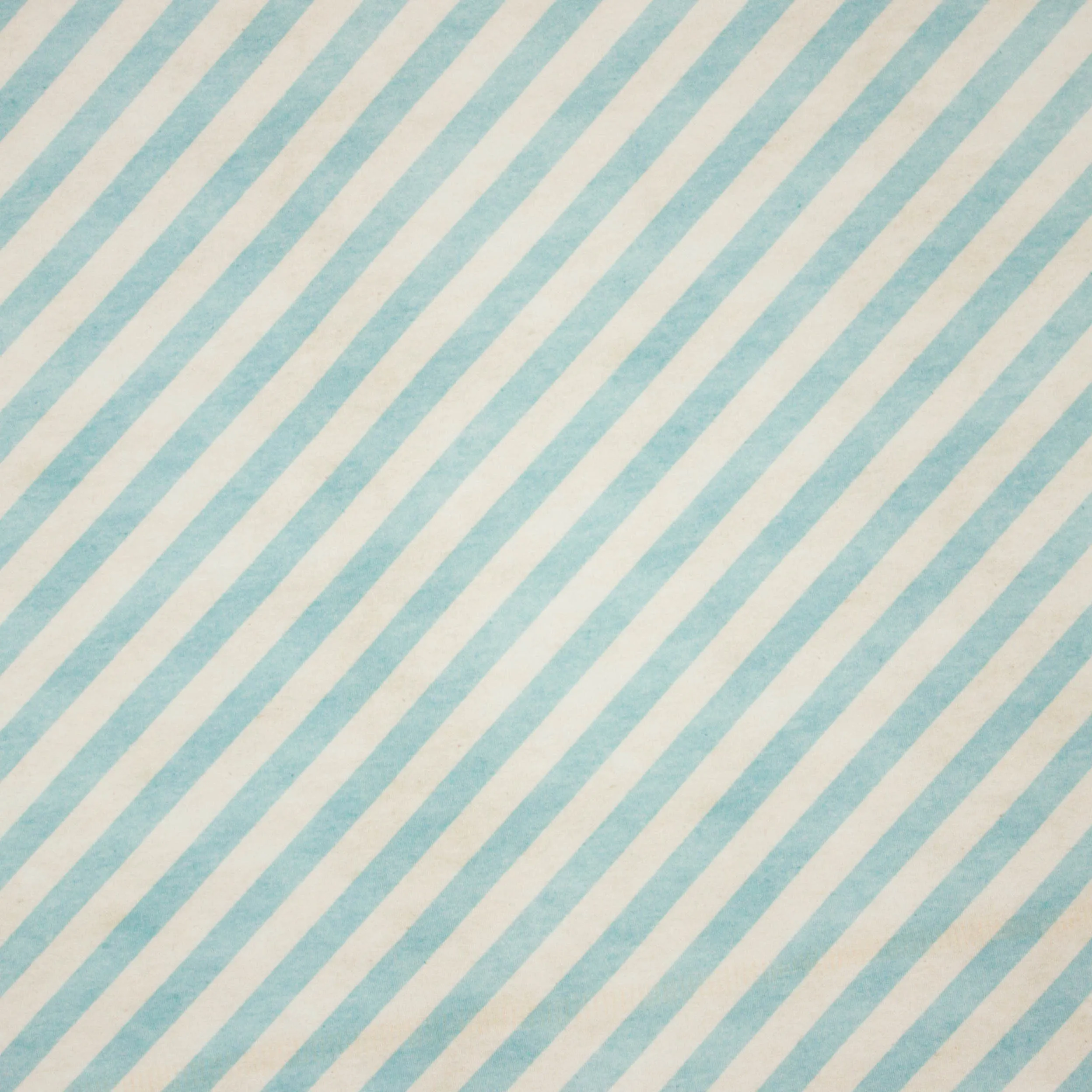 French terry met turquoise en ecru diagonale strepen van 'About Blue Fabrics'