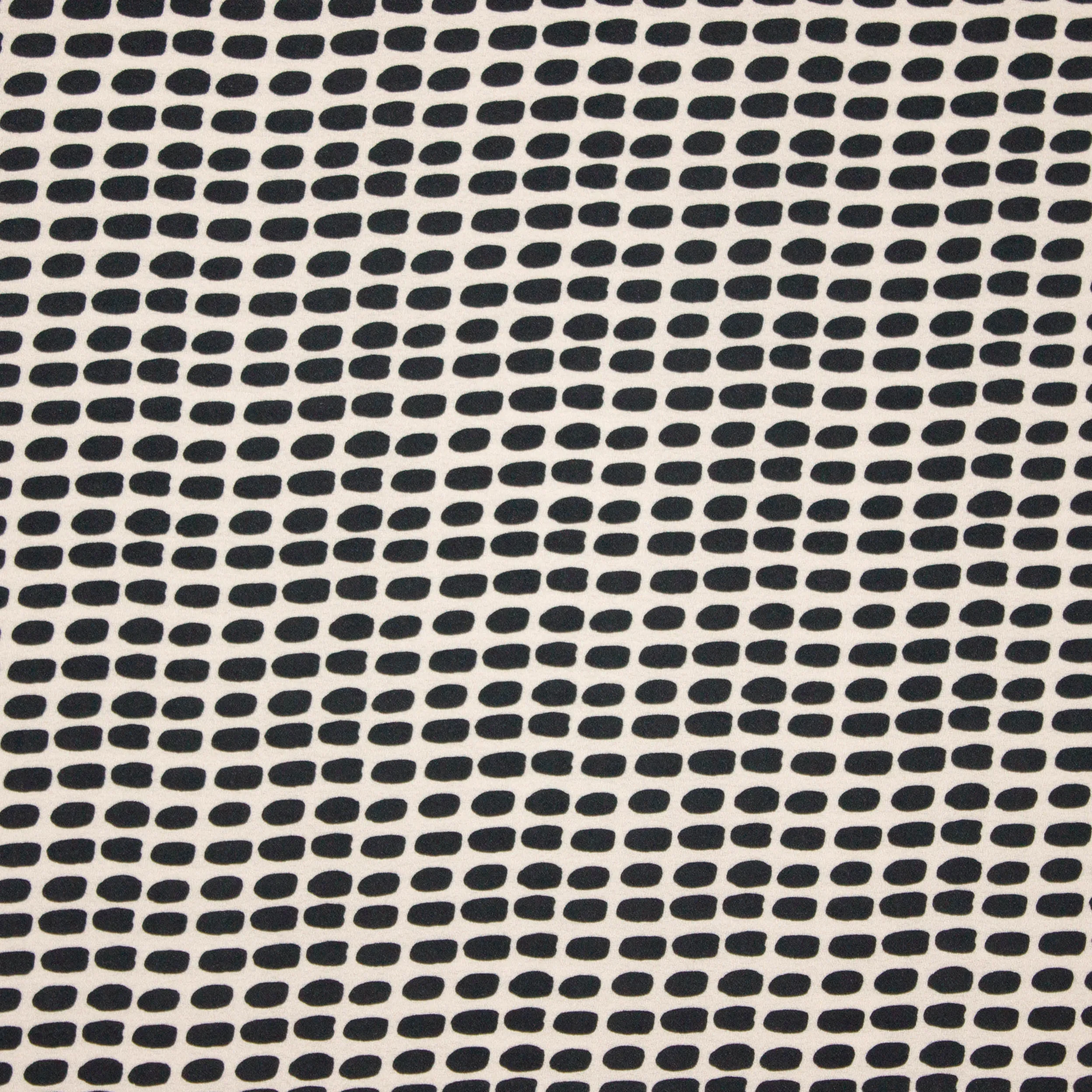 Zachte huidskleurige viscose met zwart vlekken motief
