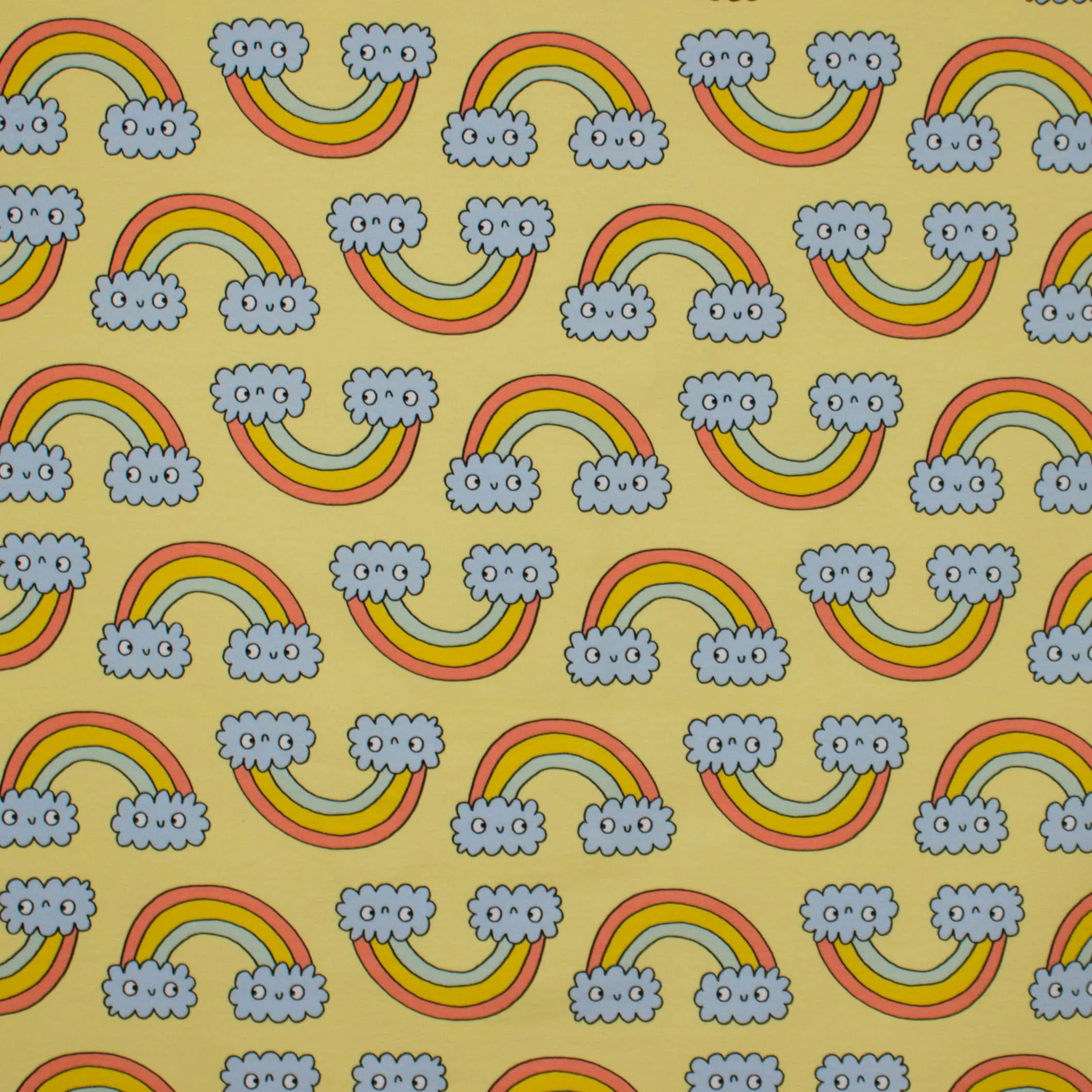 Gele french terry met regenbogen en wolkjes van Eva Mouton