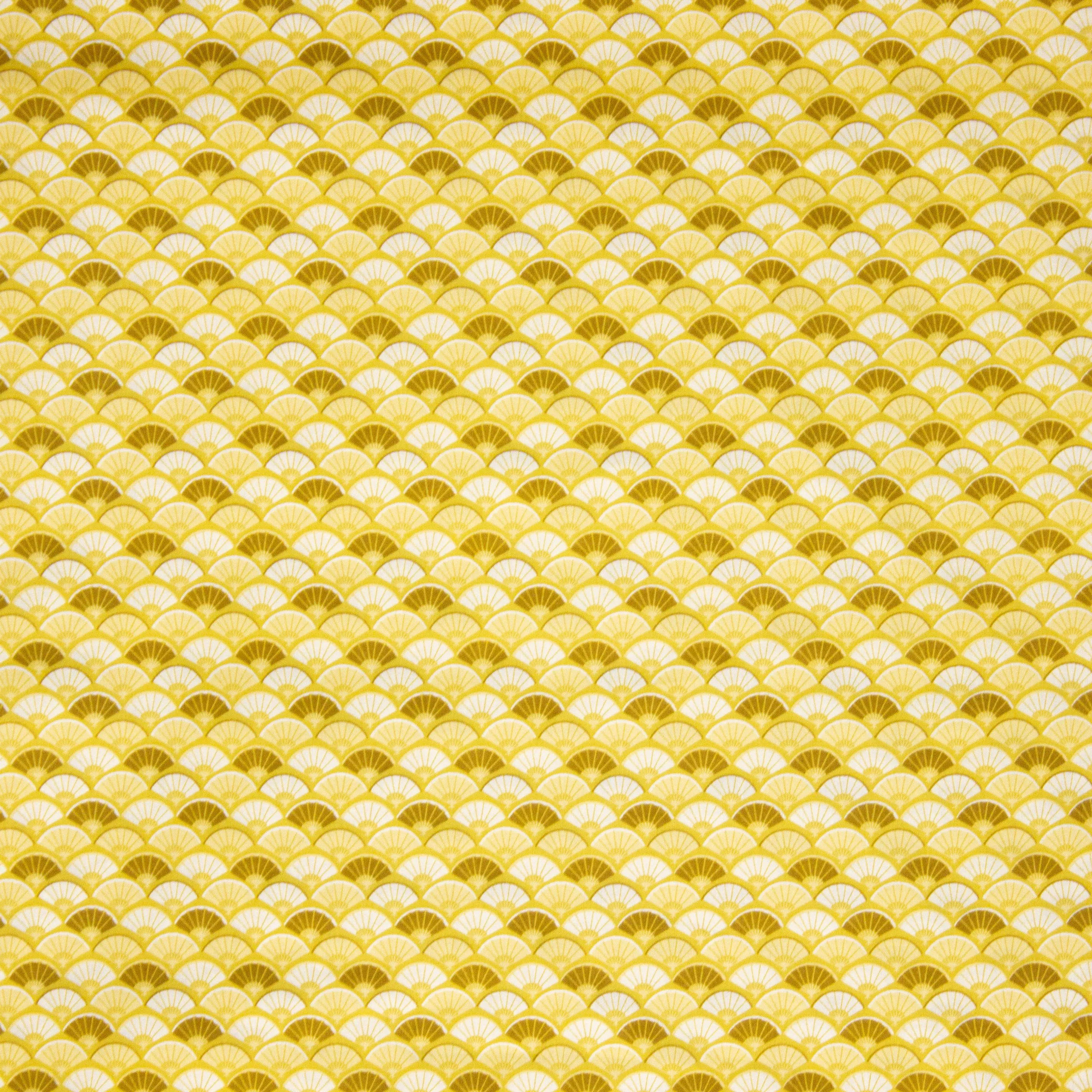 Katoen in gele en kaki tinten met abstract motief