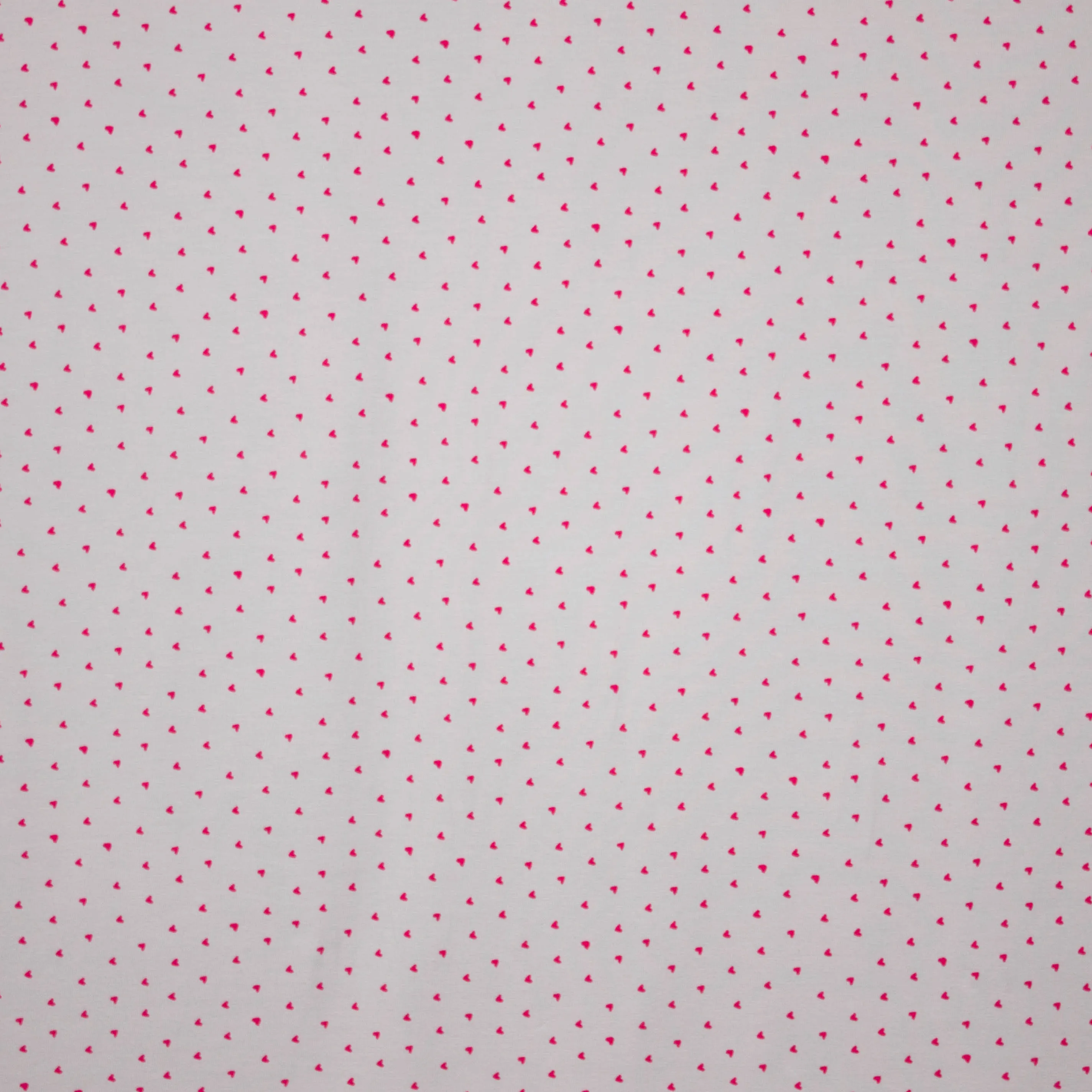 Lichtgrijze tricot met fuchsia hartjes 'Little Hearts van Poppy'