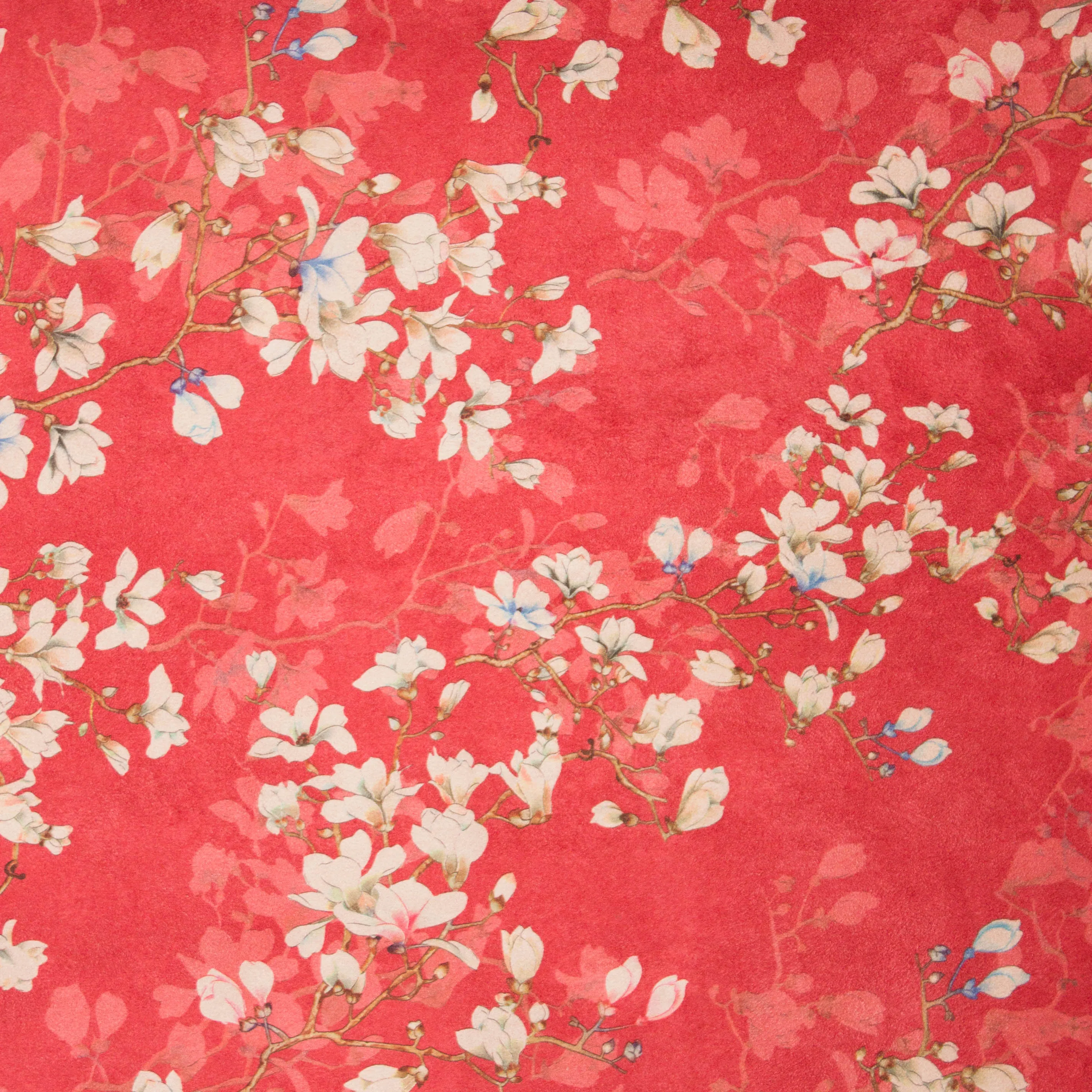 Rekbare imitatiesuede in koraalkleur met bloemenmotief