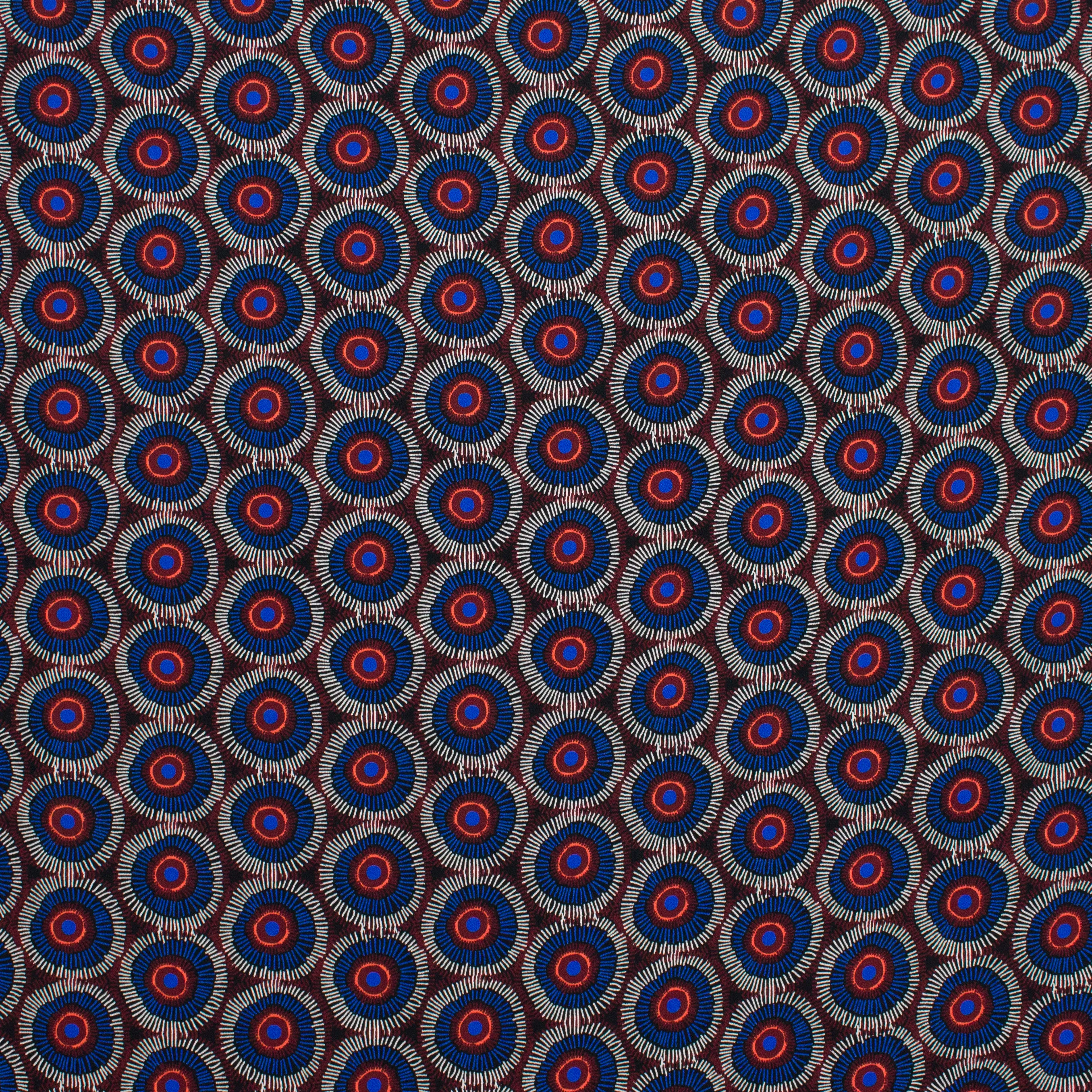 Viscose crêpe met cirkels in blauw, wit en rood