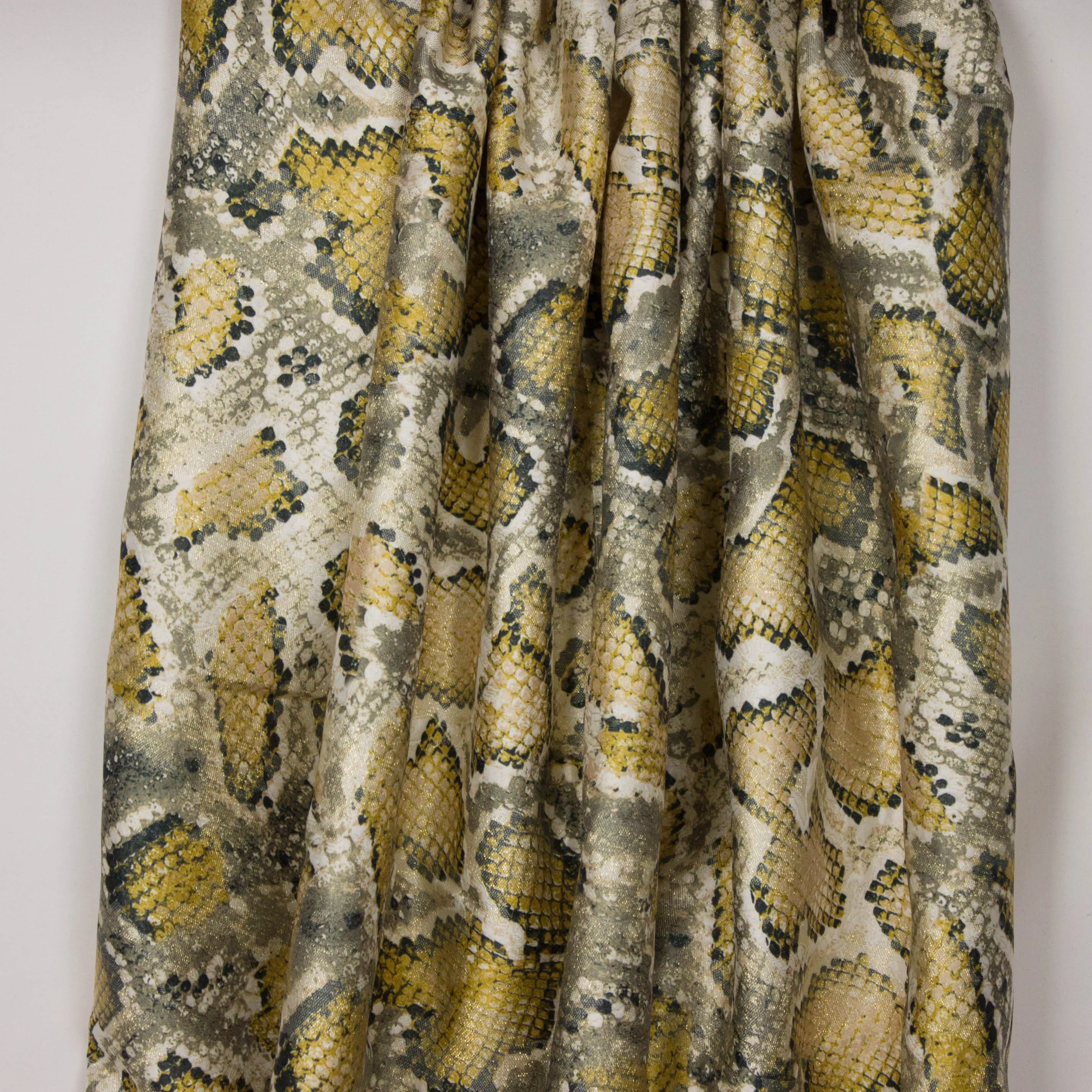 Jacquard met slangenvelmotief en gouden glitter