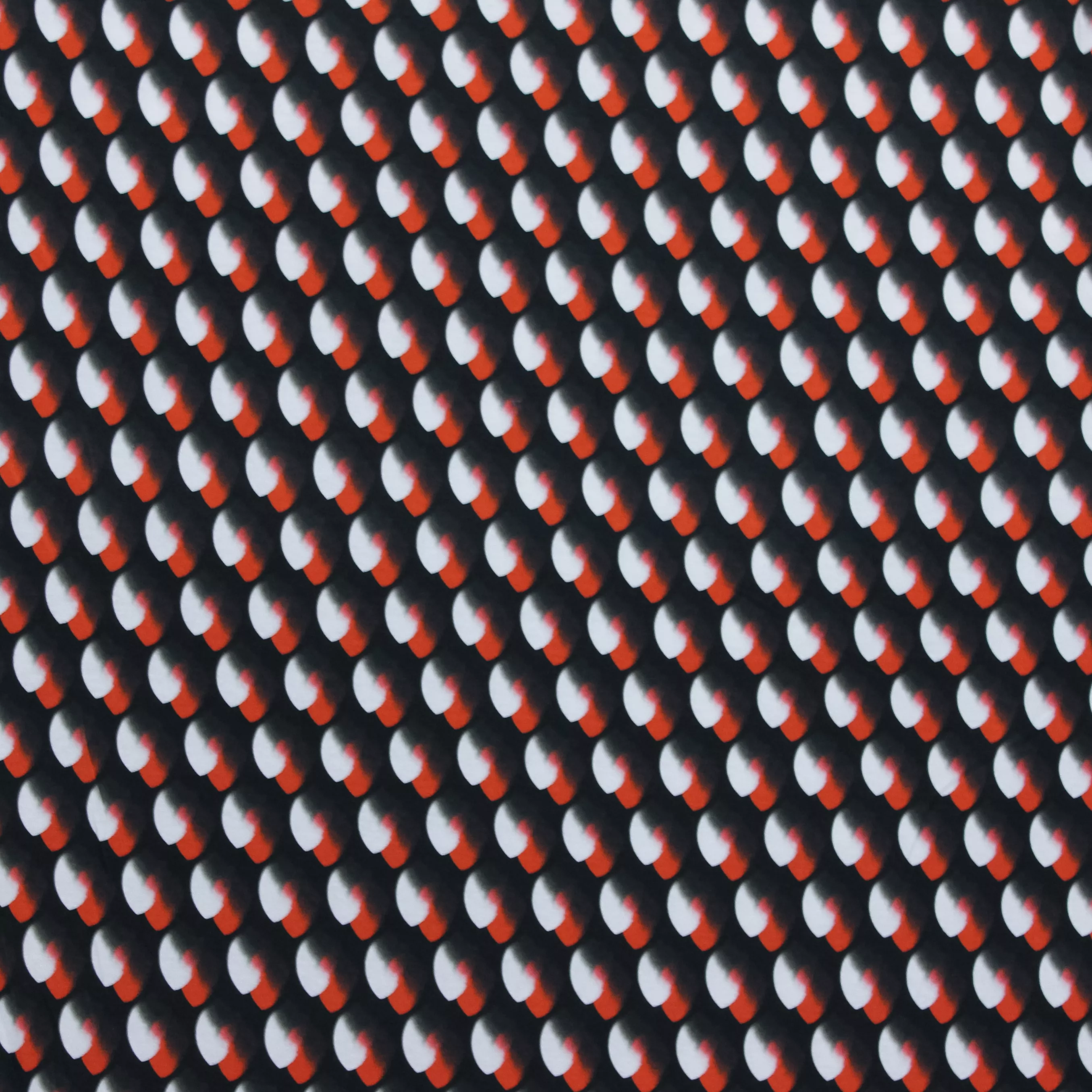 Zwarte Italiaanse viscose tricot met rood en wit motief