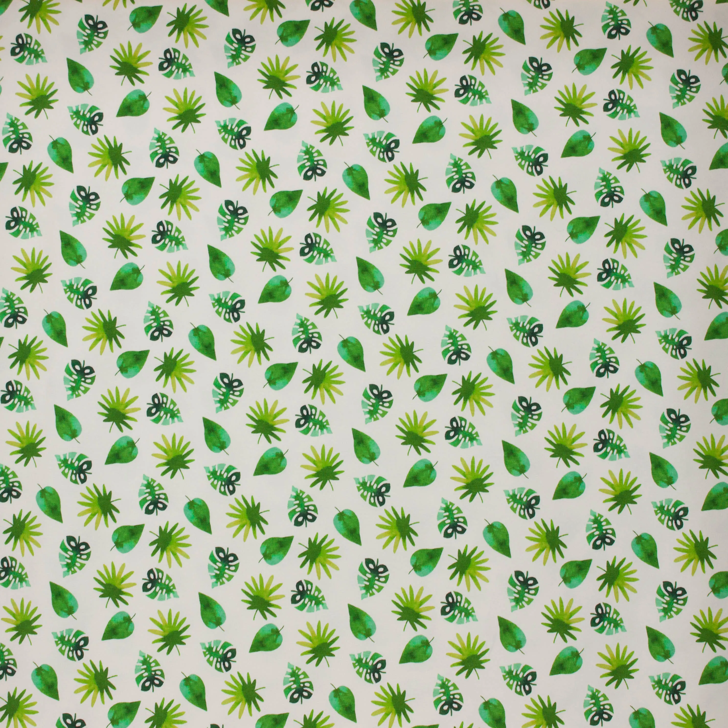 Witte tricot met tropisch blad motief