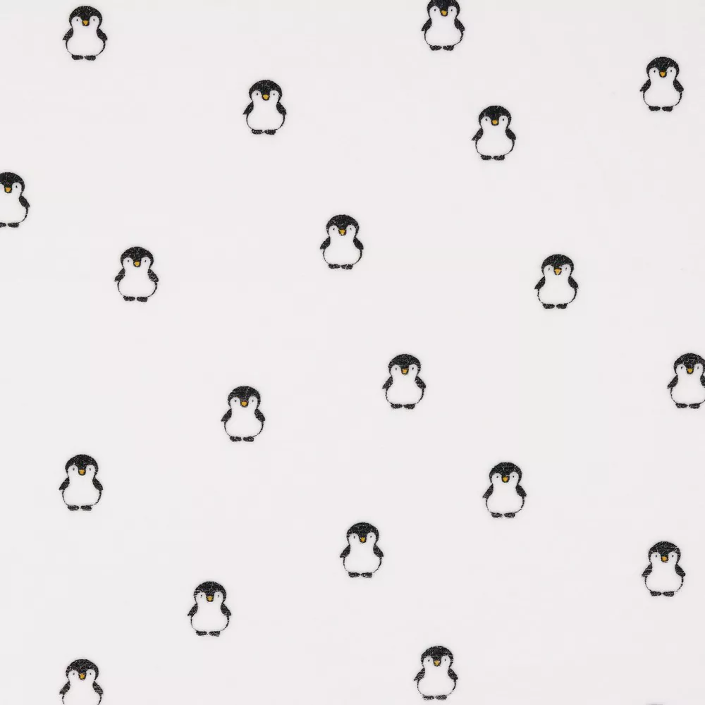 Witte nicky velours met pinguïns van Poppy