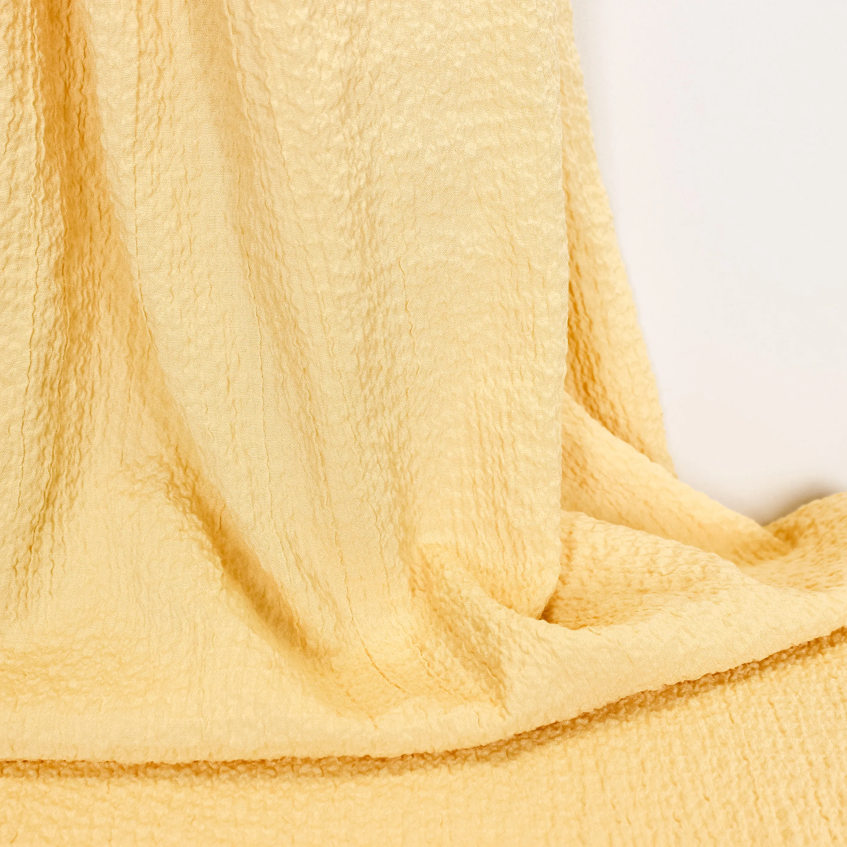 Gele viscose/polyester seersucker stretch