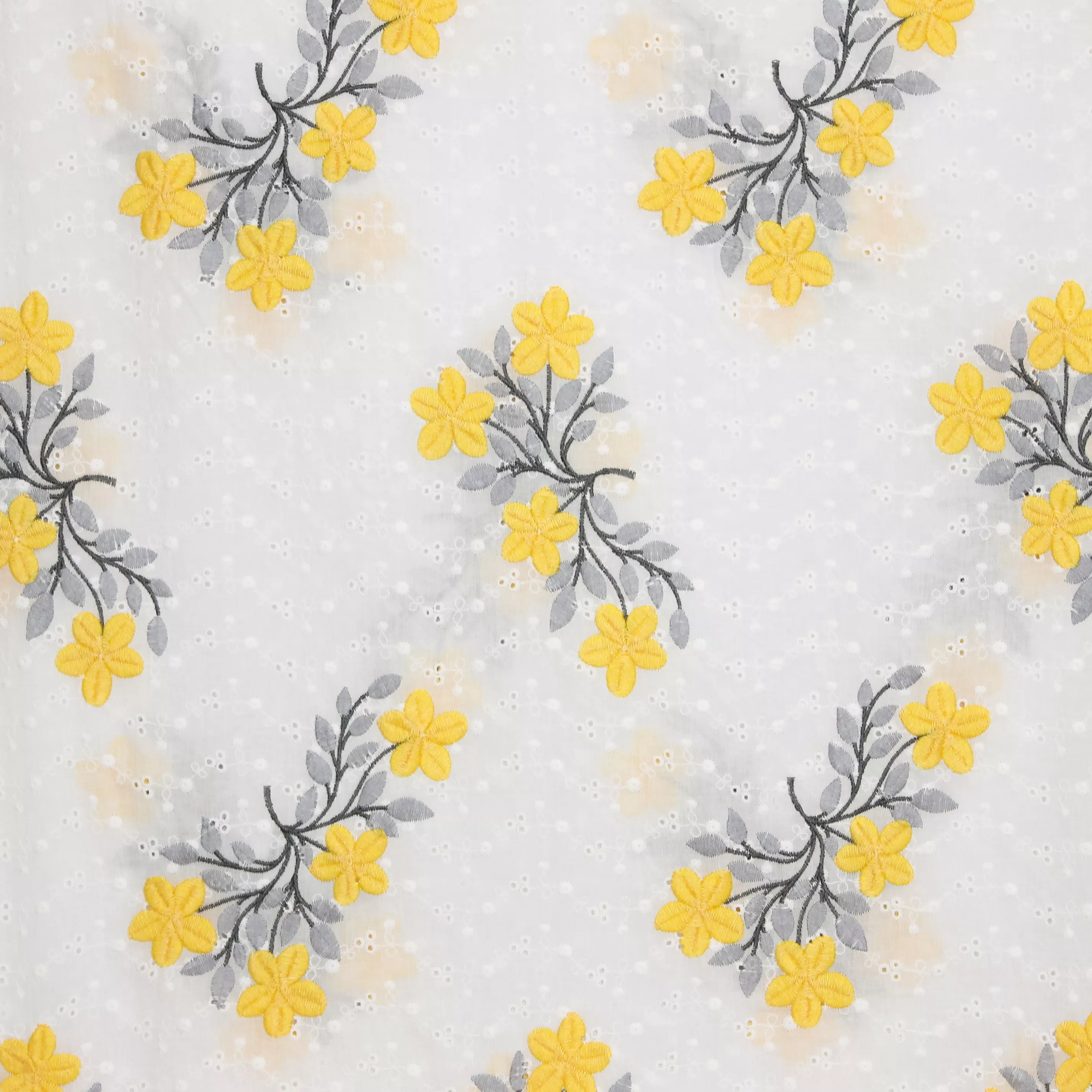 Witte katoen broderie met bloemen