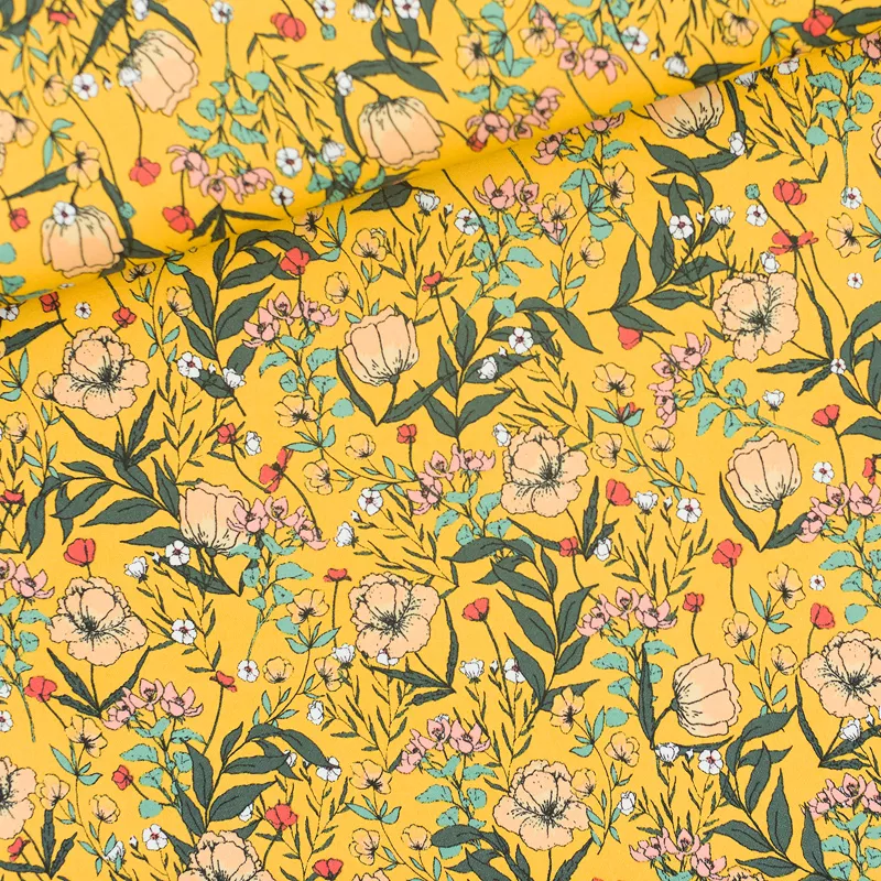 Gele lycra tricot  met bloemen 'summer flowers' van See You At Six