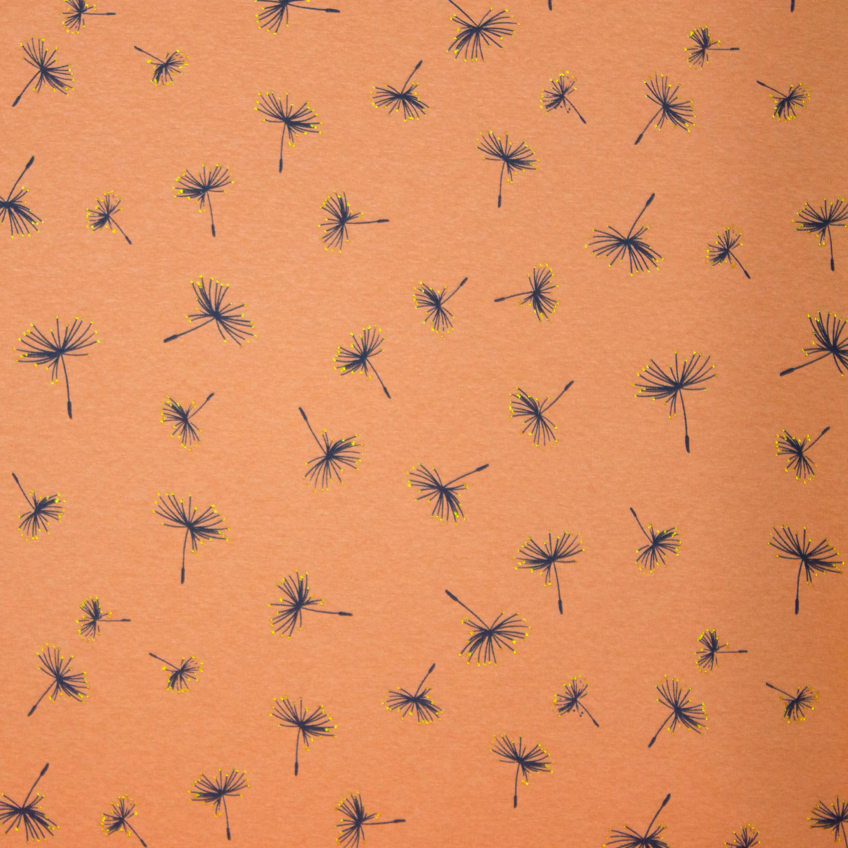 Sweaterstof oranje met zwart/goud plantenpatroon