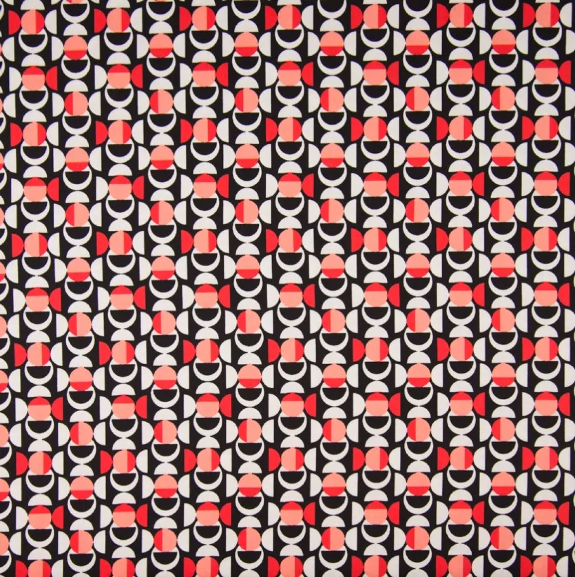 Katoen nylon stretch met cirkelpatronen in rood, wit en zwart