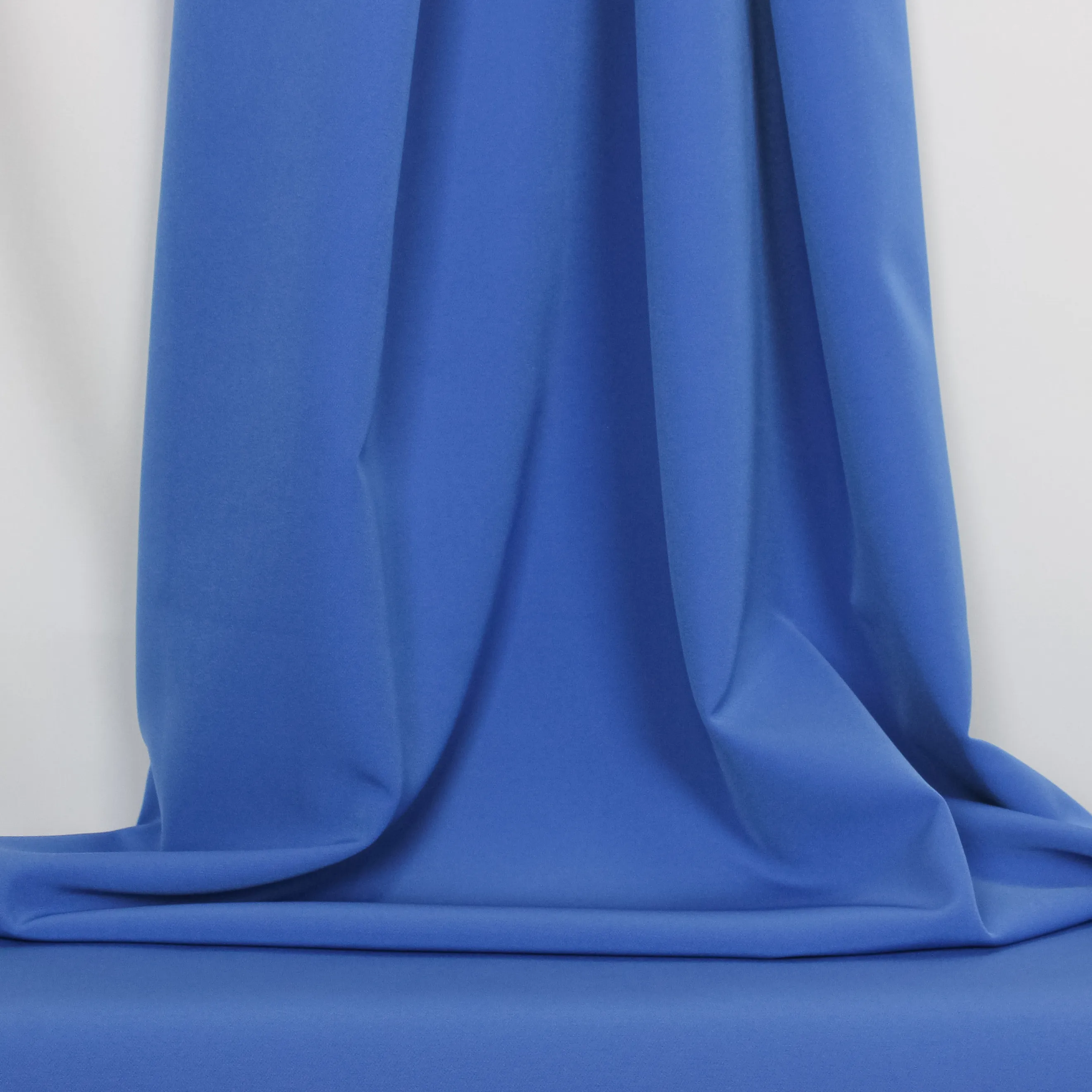 Blauwe effen polyester stretch