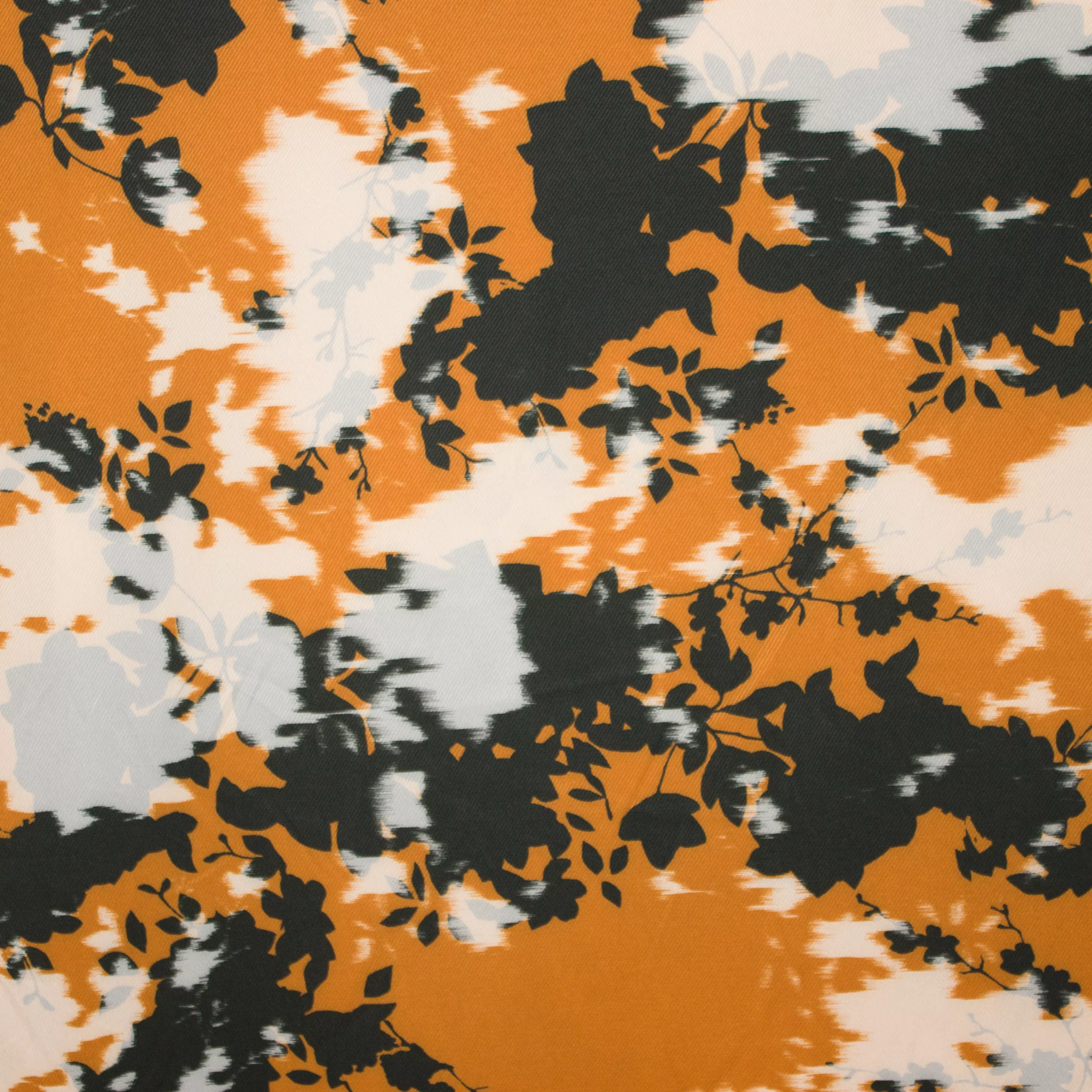 Bruine rekbare polyester met abstract bloemenmotief van La Maison Victor