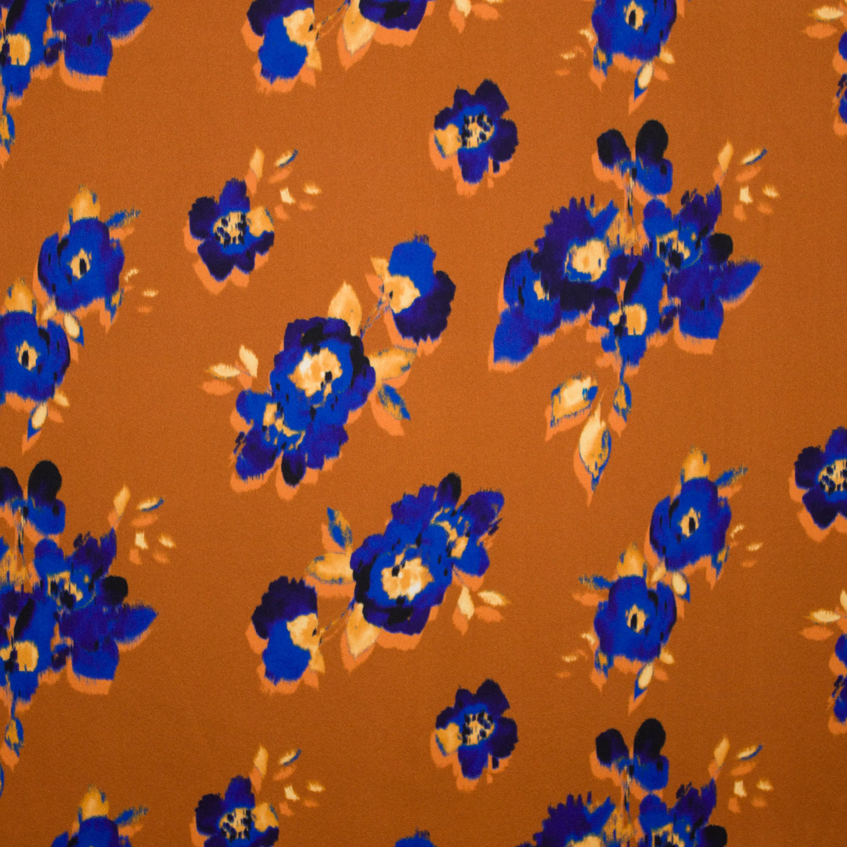 Roestkleurige rekbare viscose met bloemen van La Maison Victor