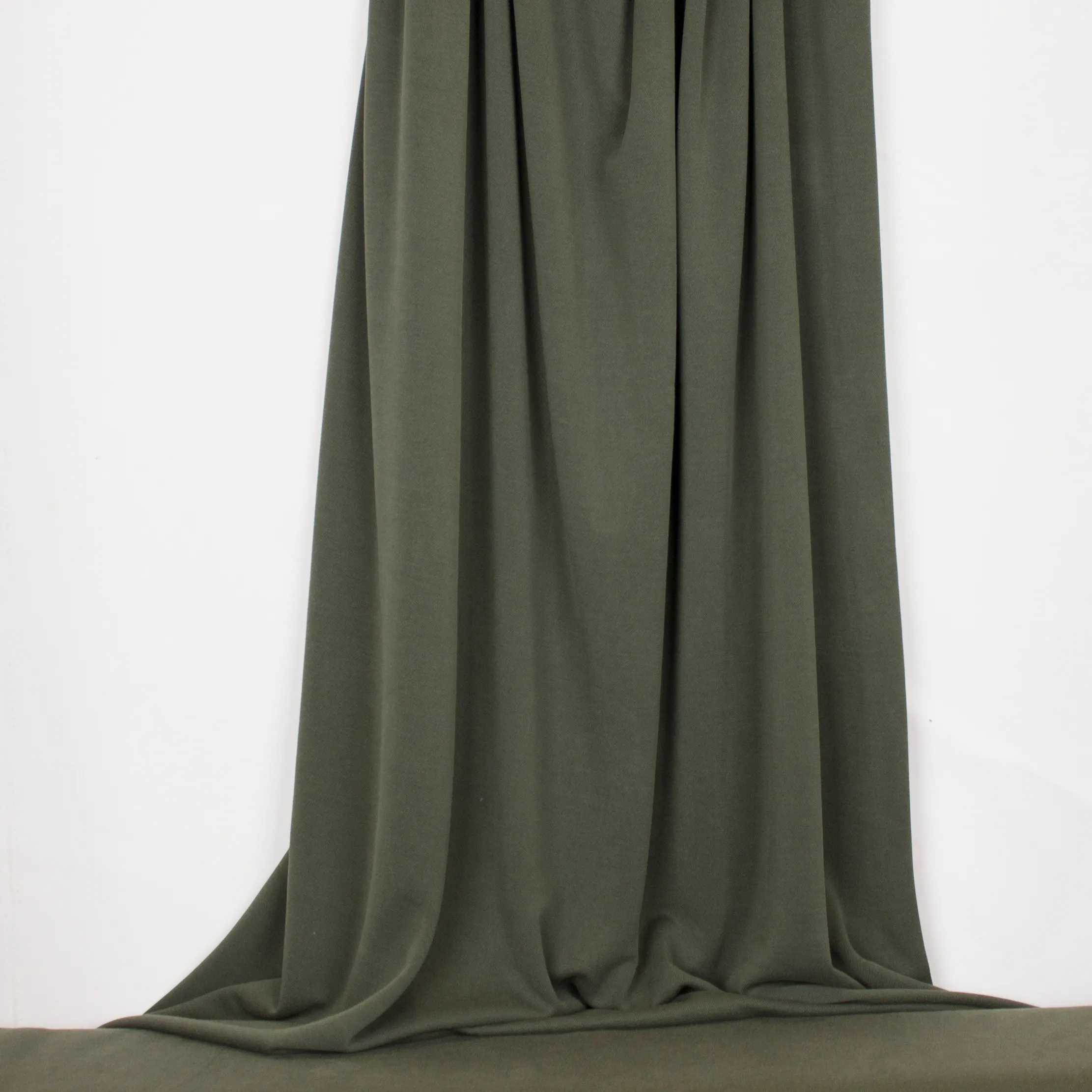 Groene tricot in modal/polyestermengeling van La Maison Victor
