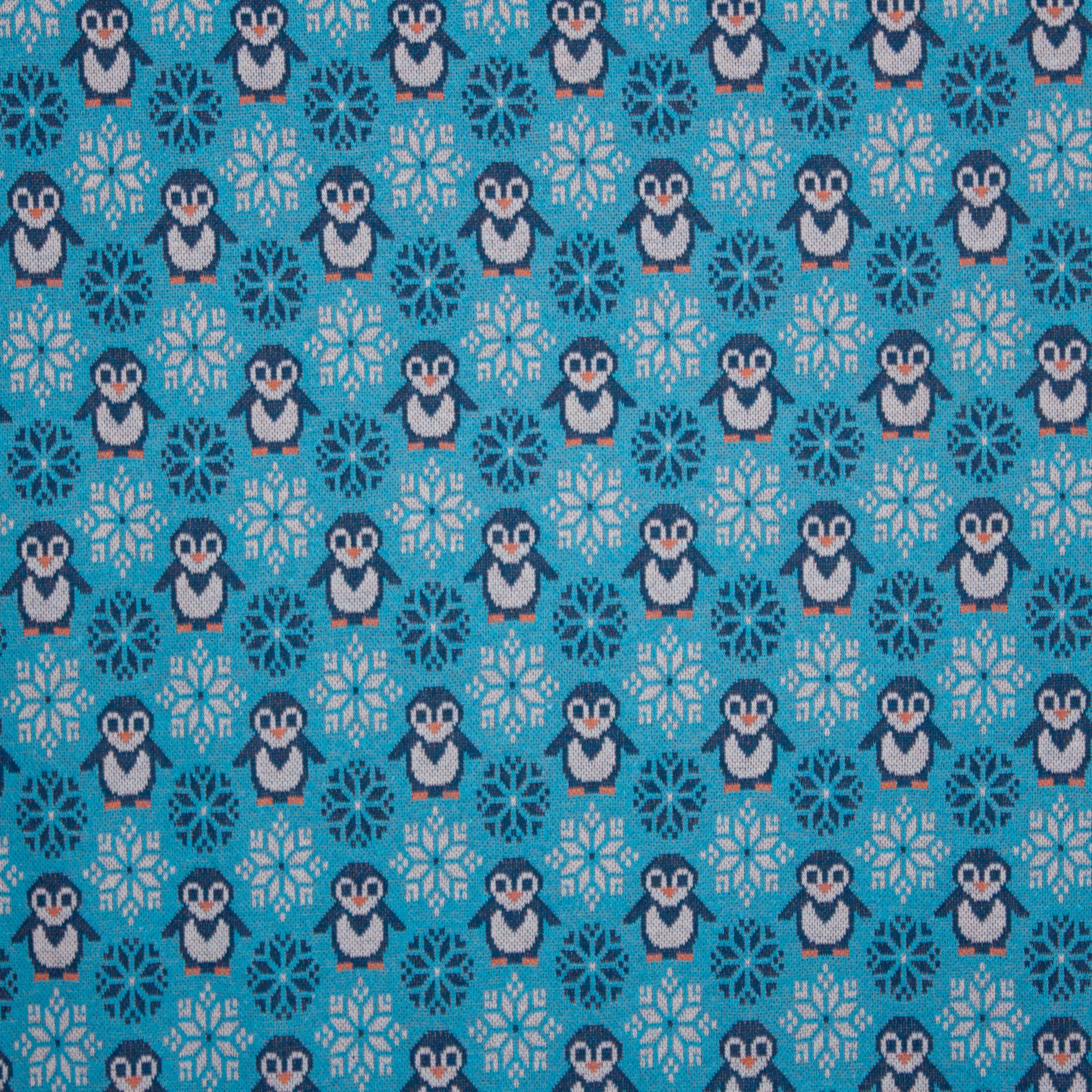 Turquoise jacquardtricot met pinguïns en ijskristallen