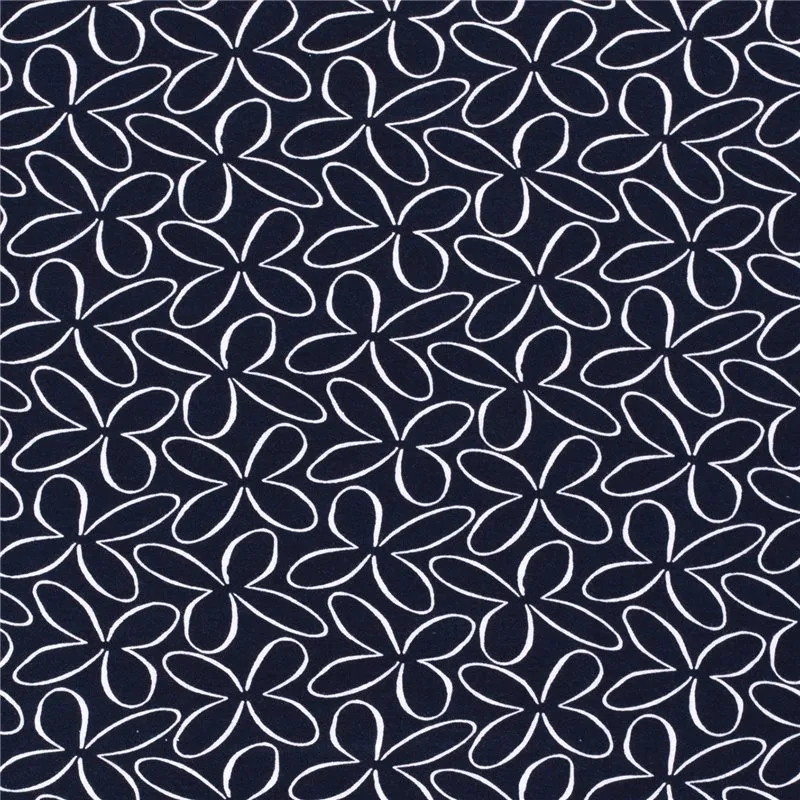 Donkerblauwe viscose tricot met wit bloemenmotief