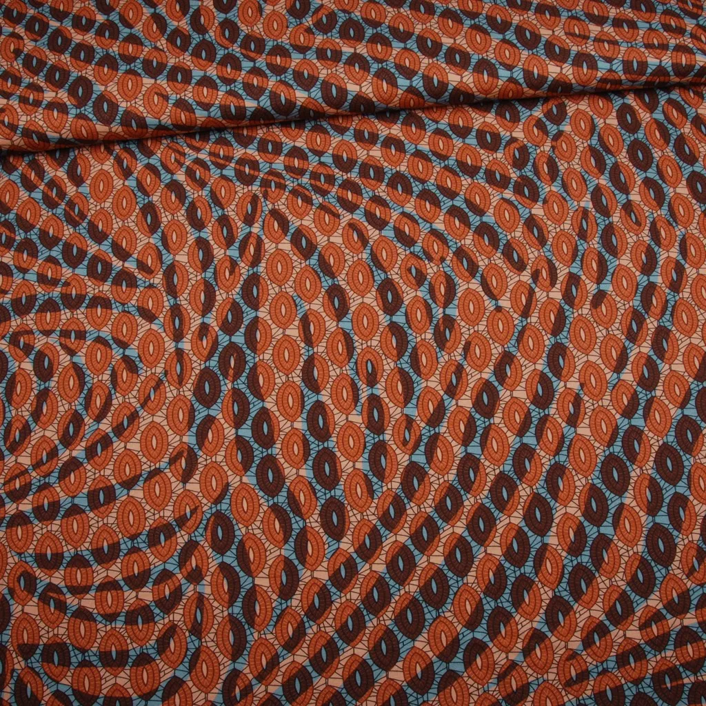 Viscose stretch oranje met patroon 'Ovals'