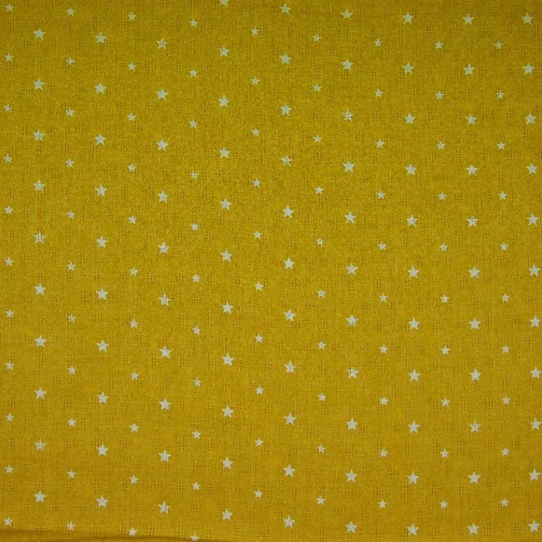 okerkleurige katoen met witte sterretjes.